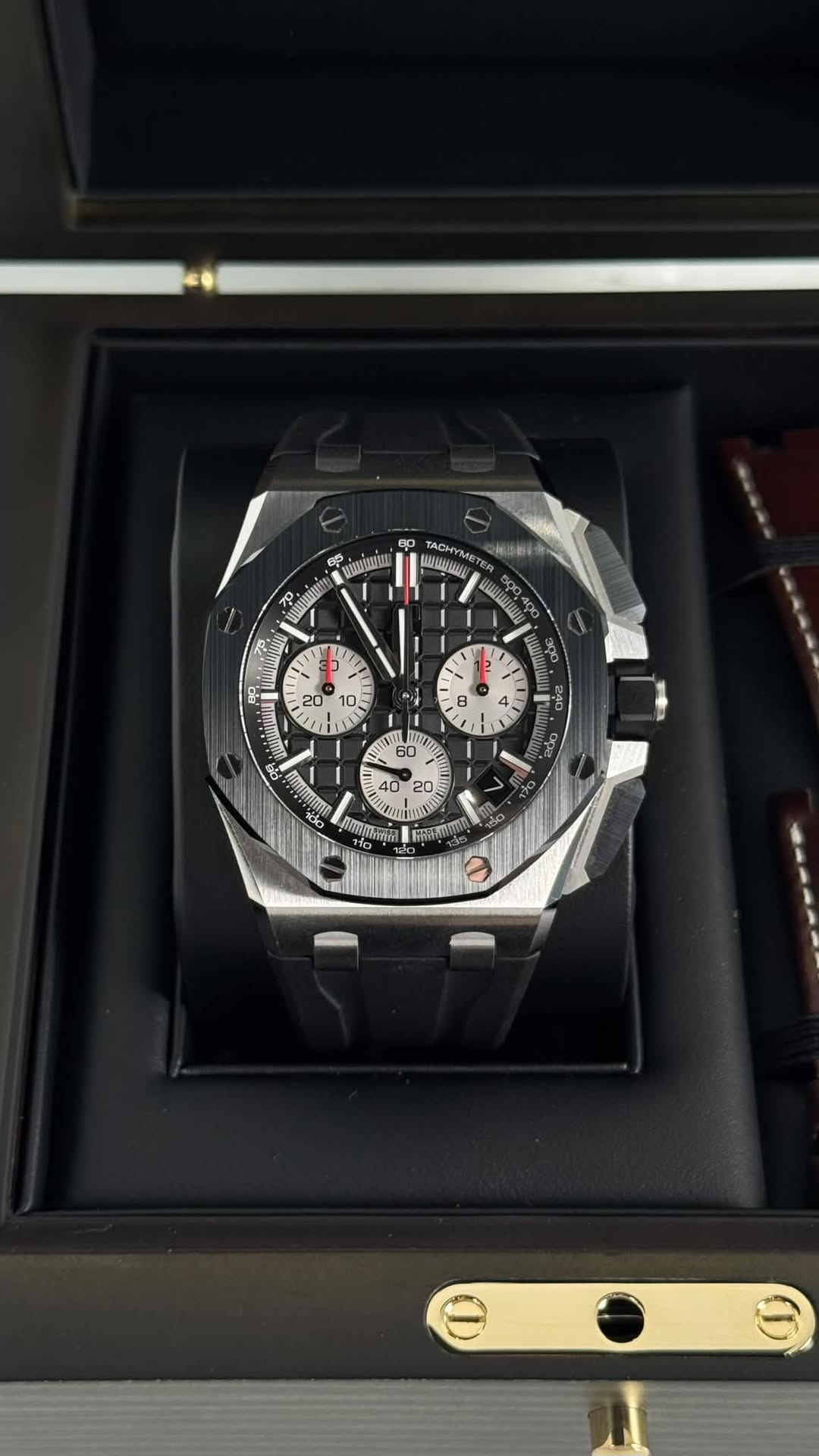 May be an image of wrist watch and text