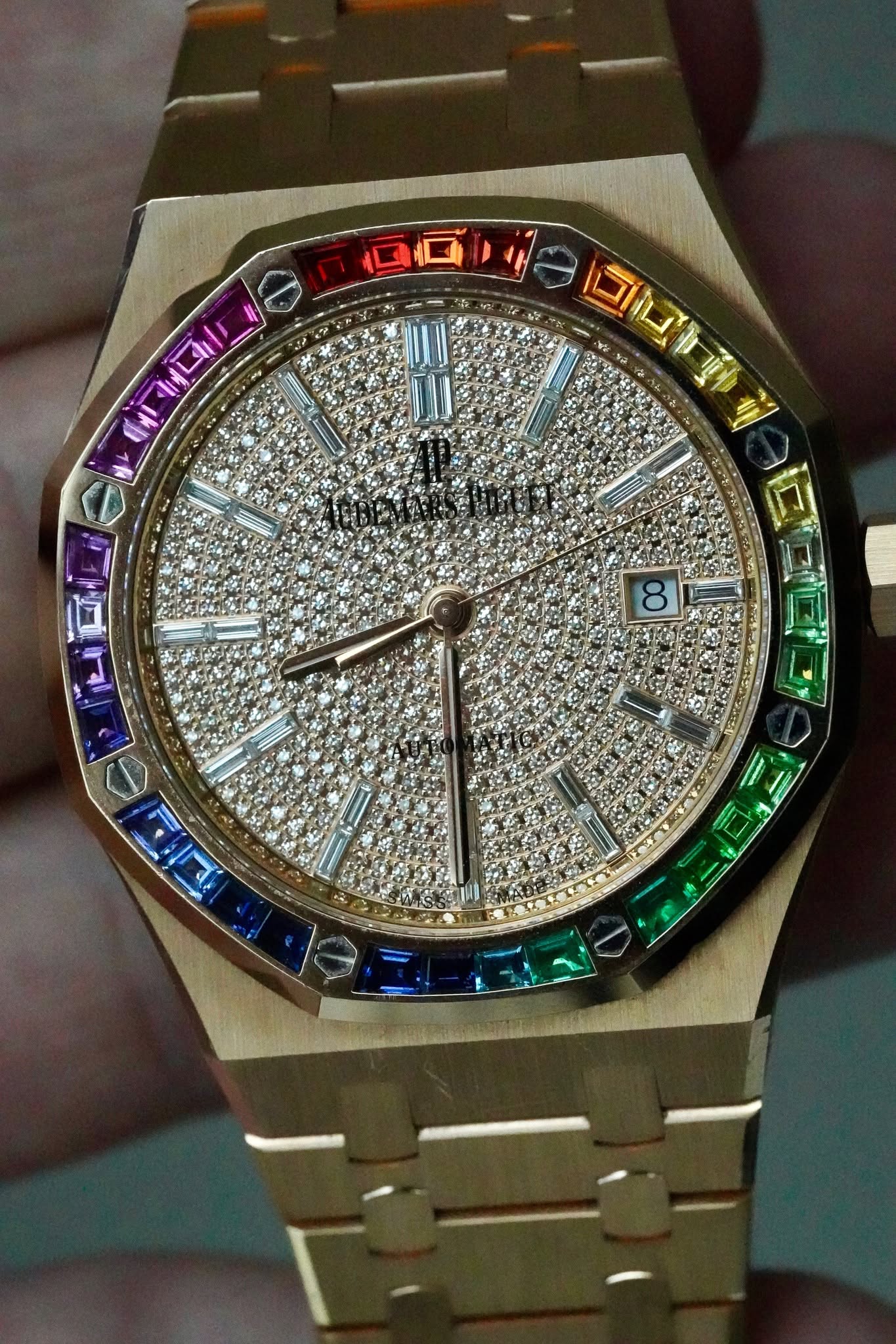 May be an image of wrist watch and text