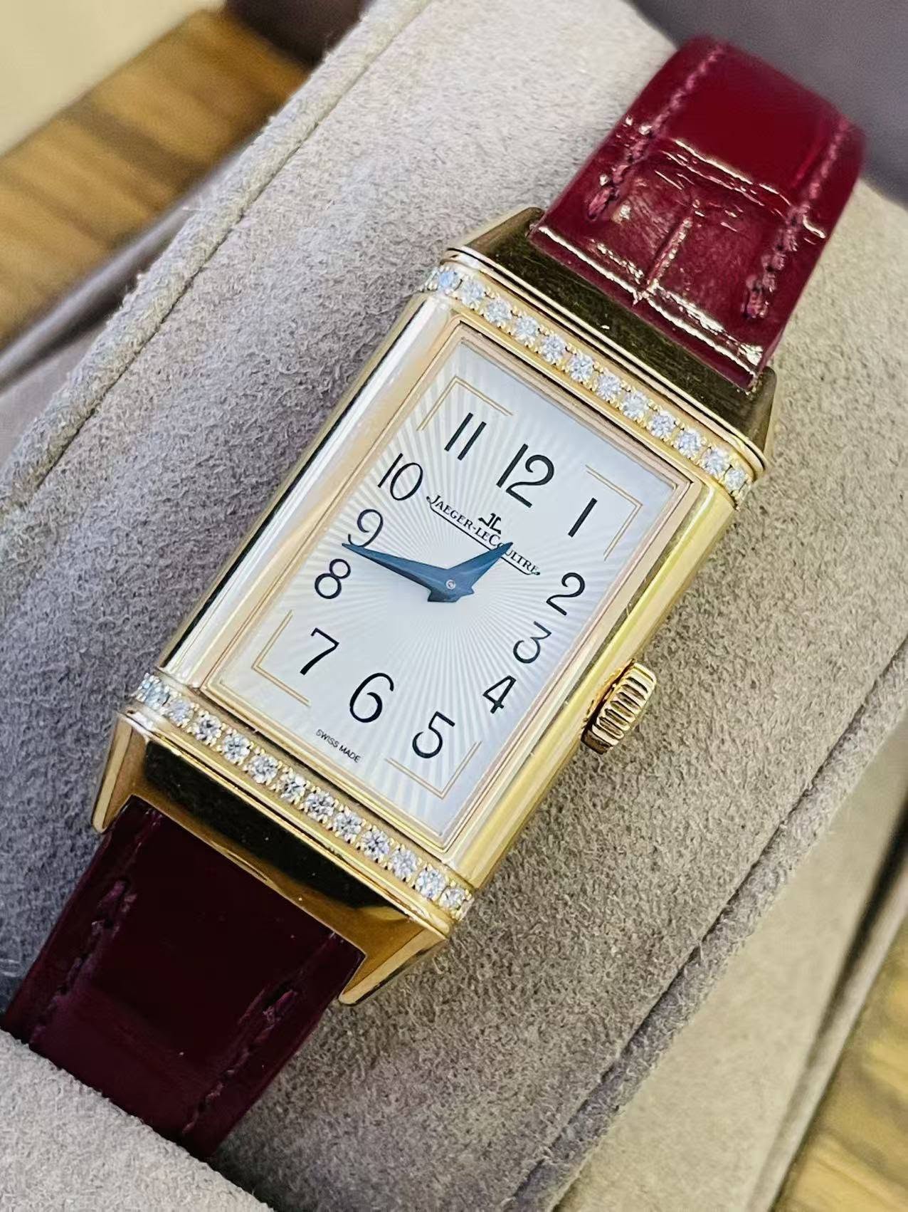 May be an image of wrist watch and text