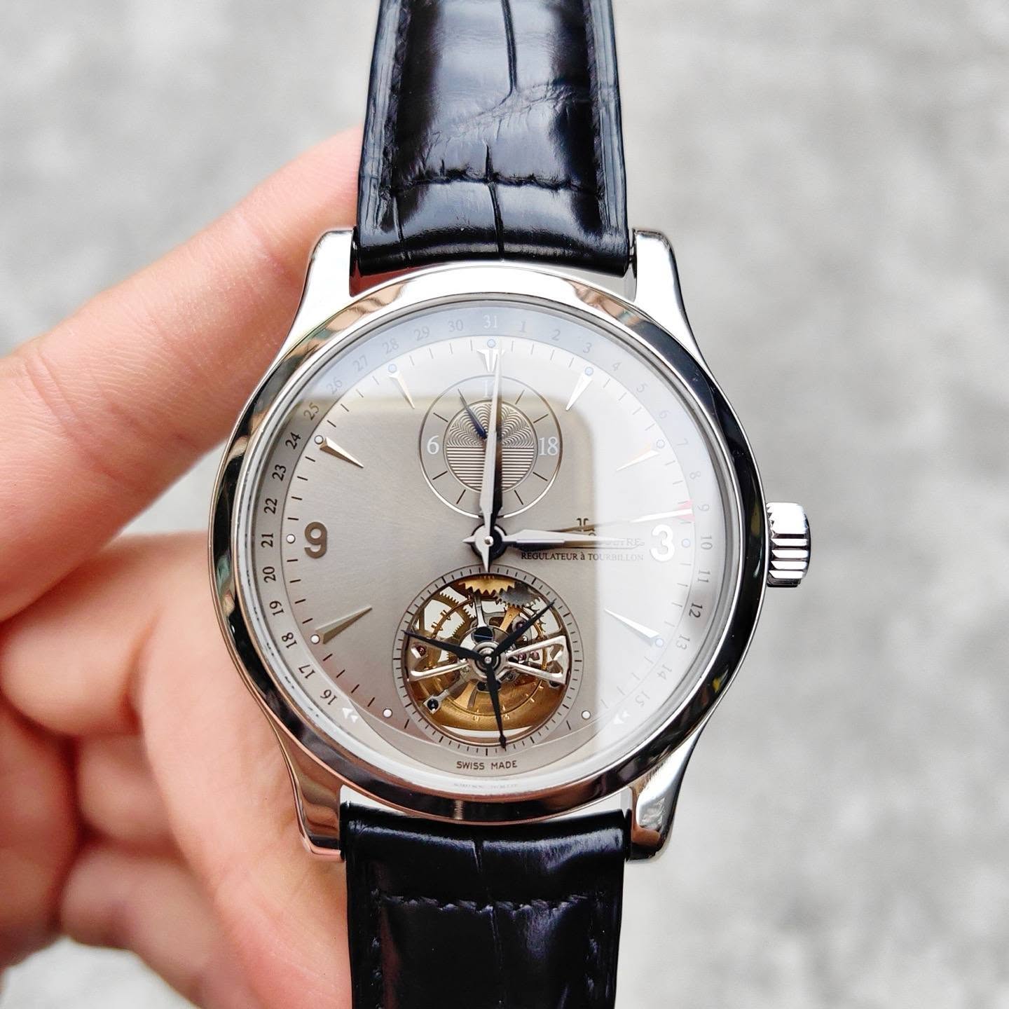 May be an image of wrist watch and text