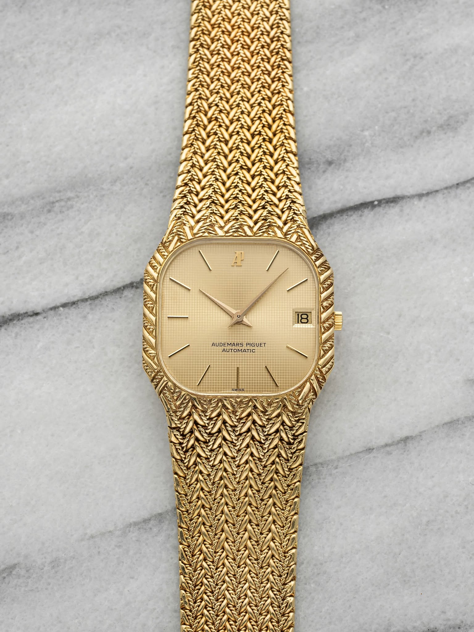 May be an image of wrist watch