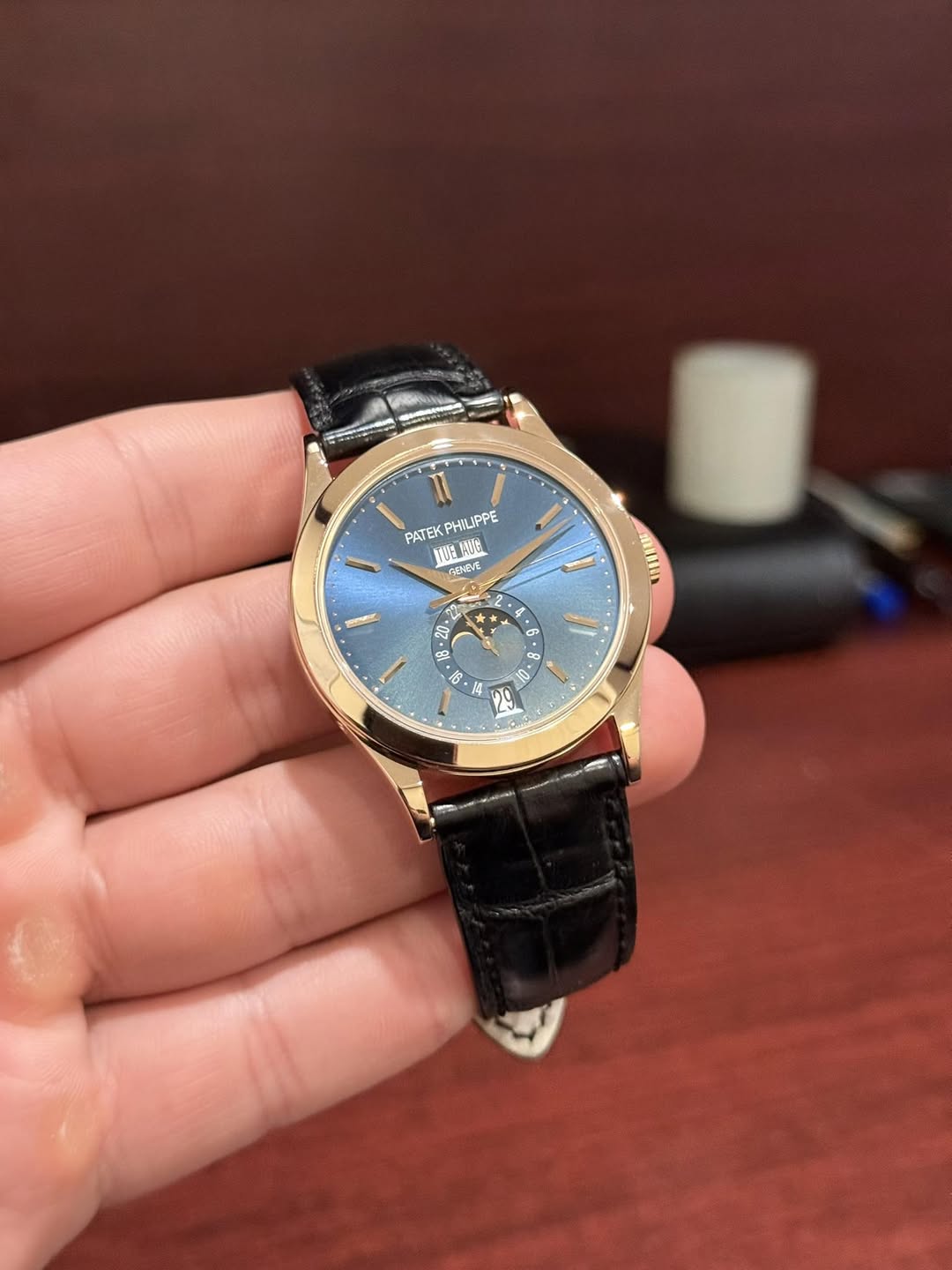 May be an image of wrist watch and text