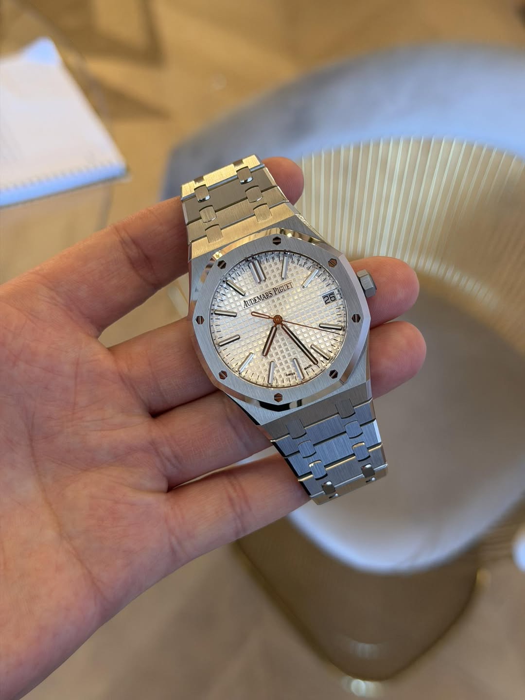 May be an image of wrist watch and text