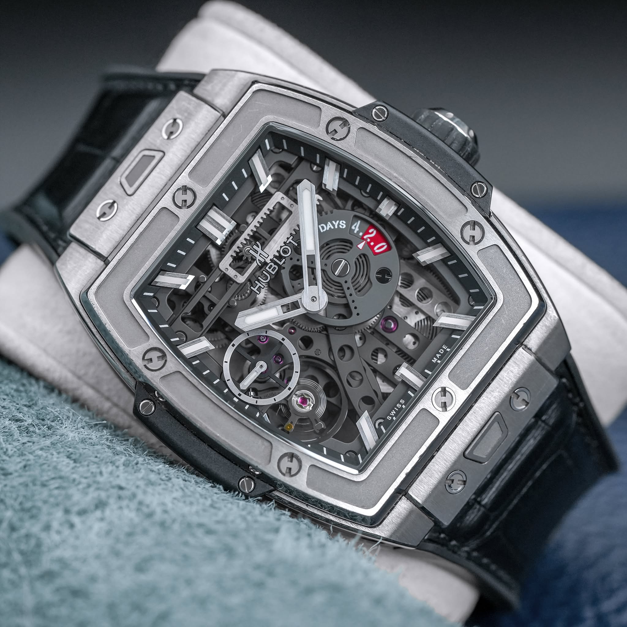 May be an image of wrist watch and text