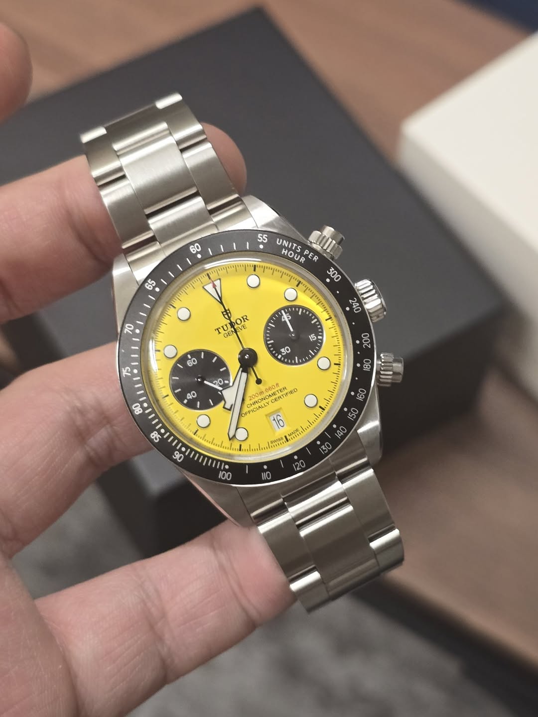May be an image of wrist watch and text