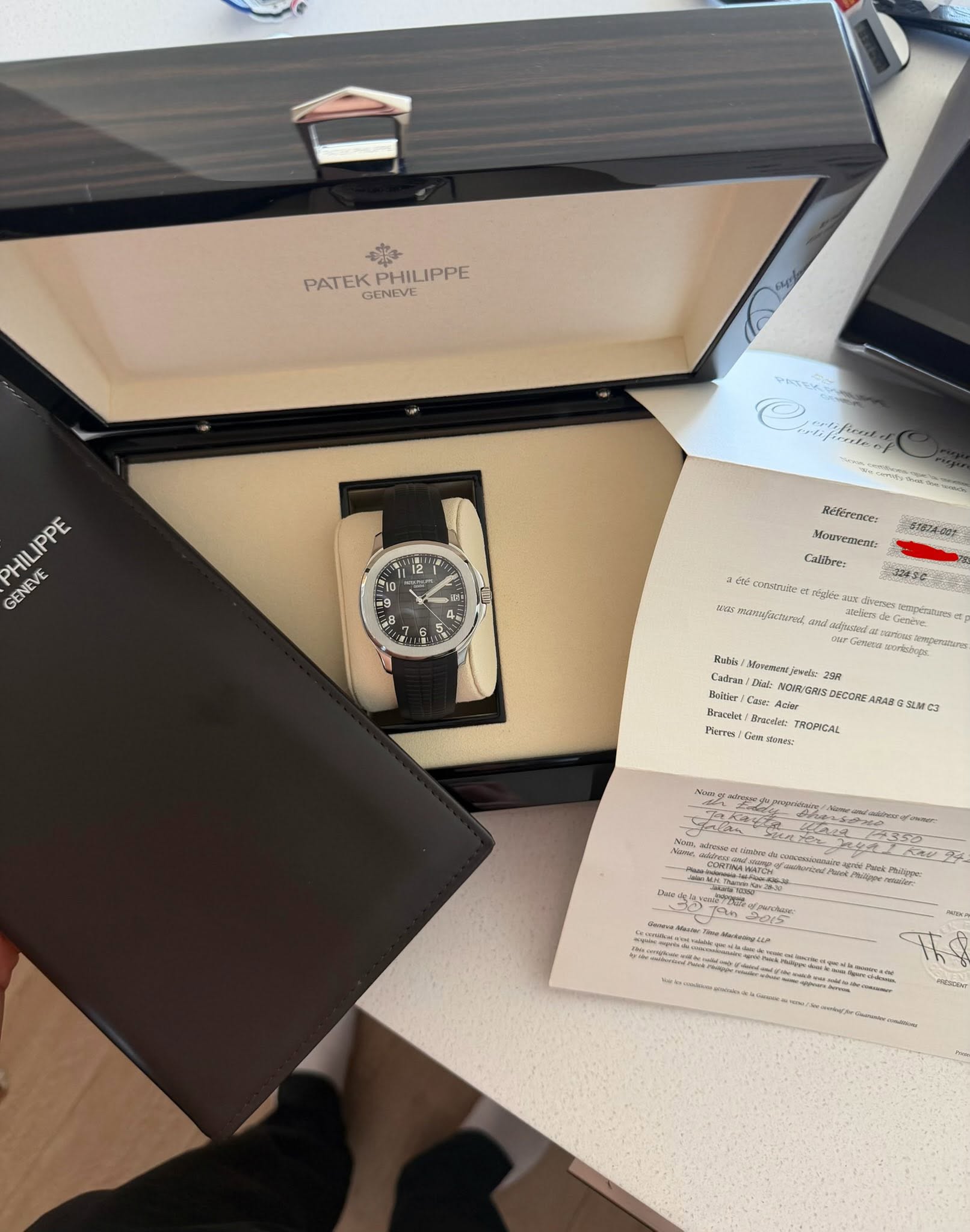 May be an image of wrist watch and text