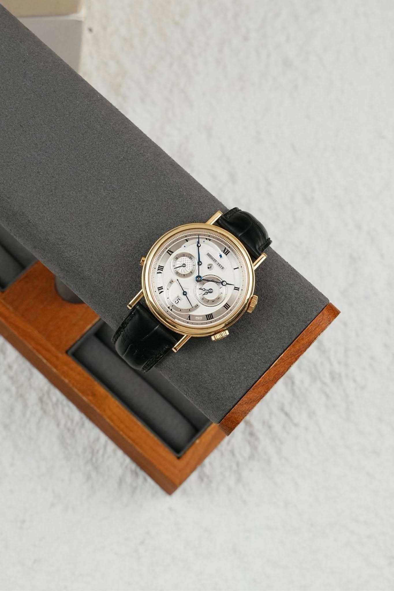 May be an image of wrist watch and text