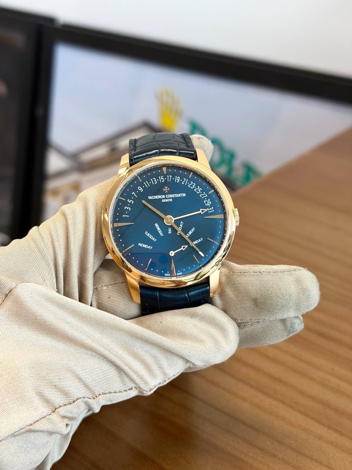 May be an image of wrist watch and text