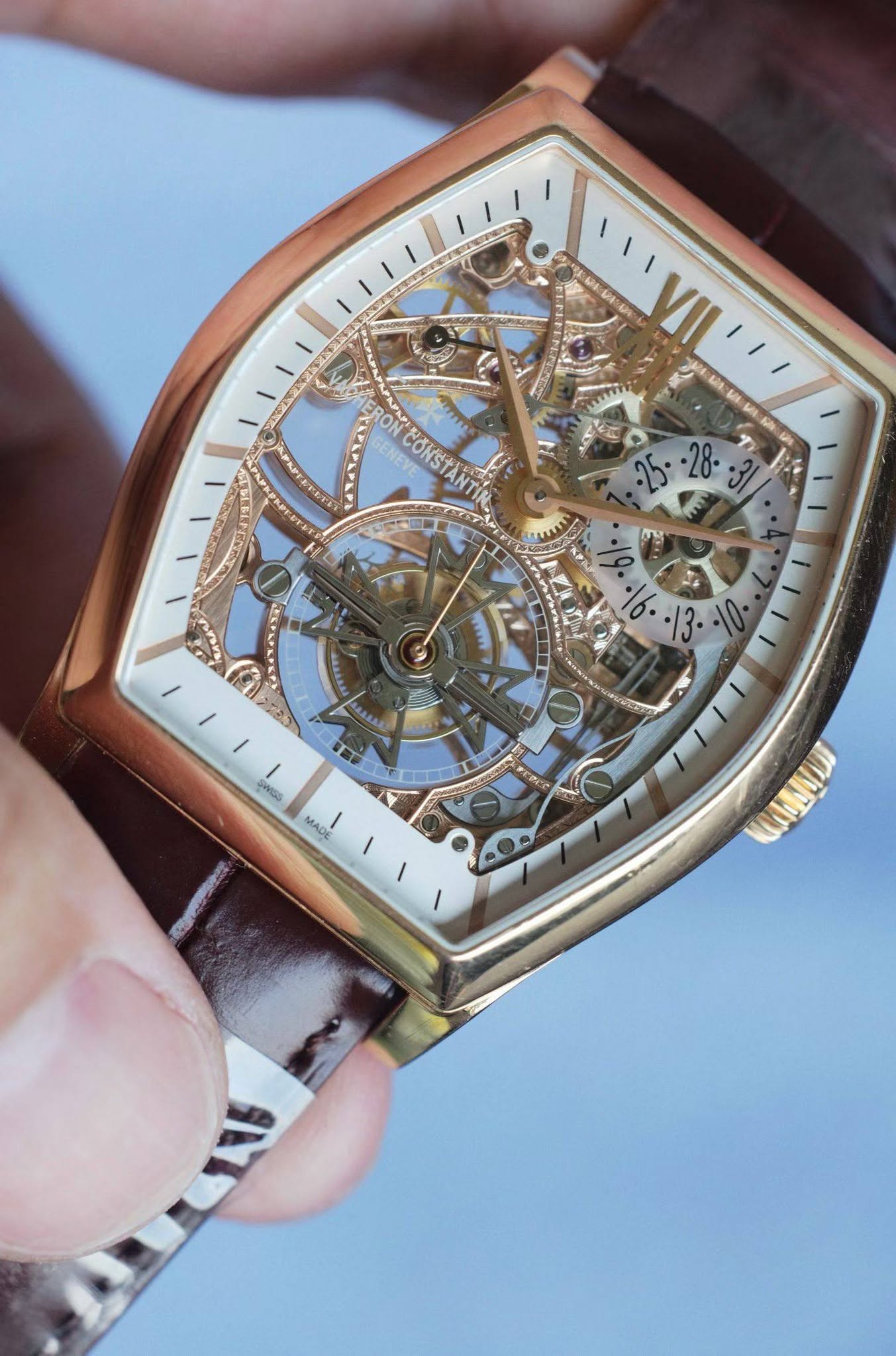 May be an image of wrist watch and text