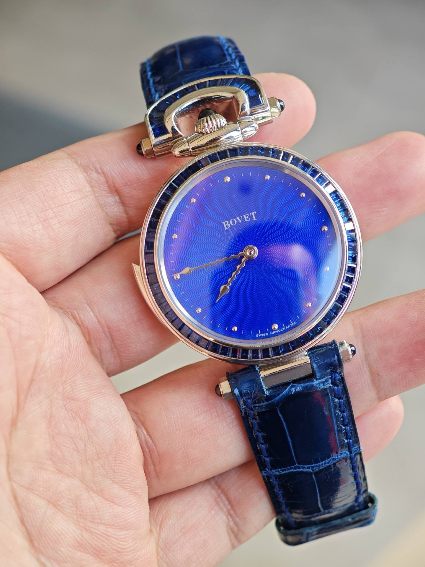 May be an image of wrist watch and text