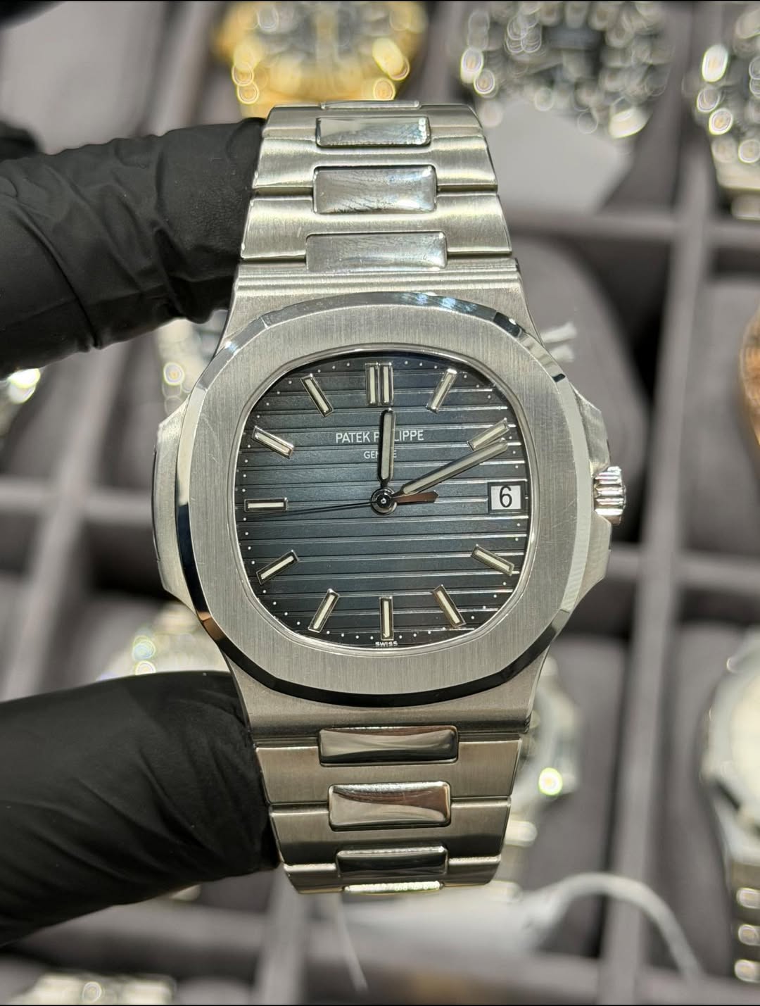 May be an image of wrist watch and text that says '١ II PATEKF GET IPPE PPE م ١ ١'