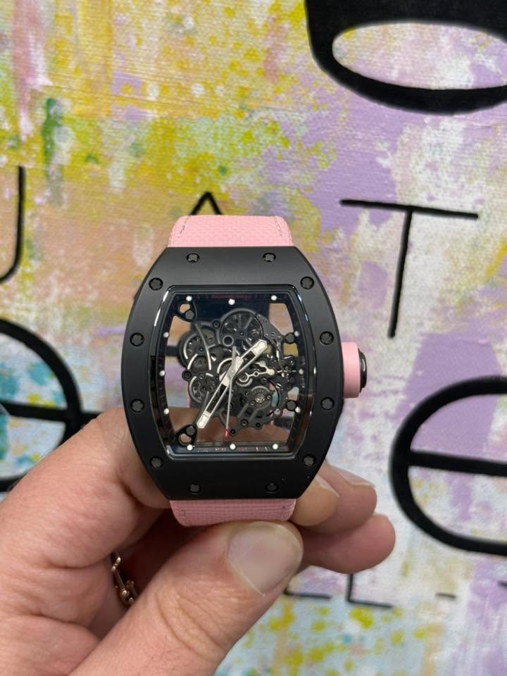 May be an image of wrist watch and text
