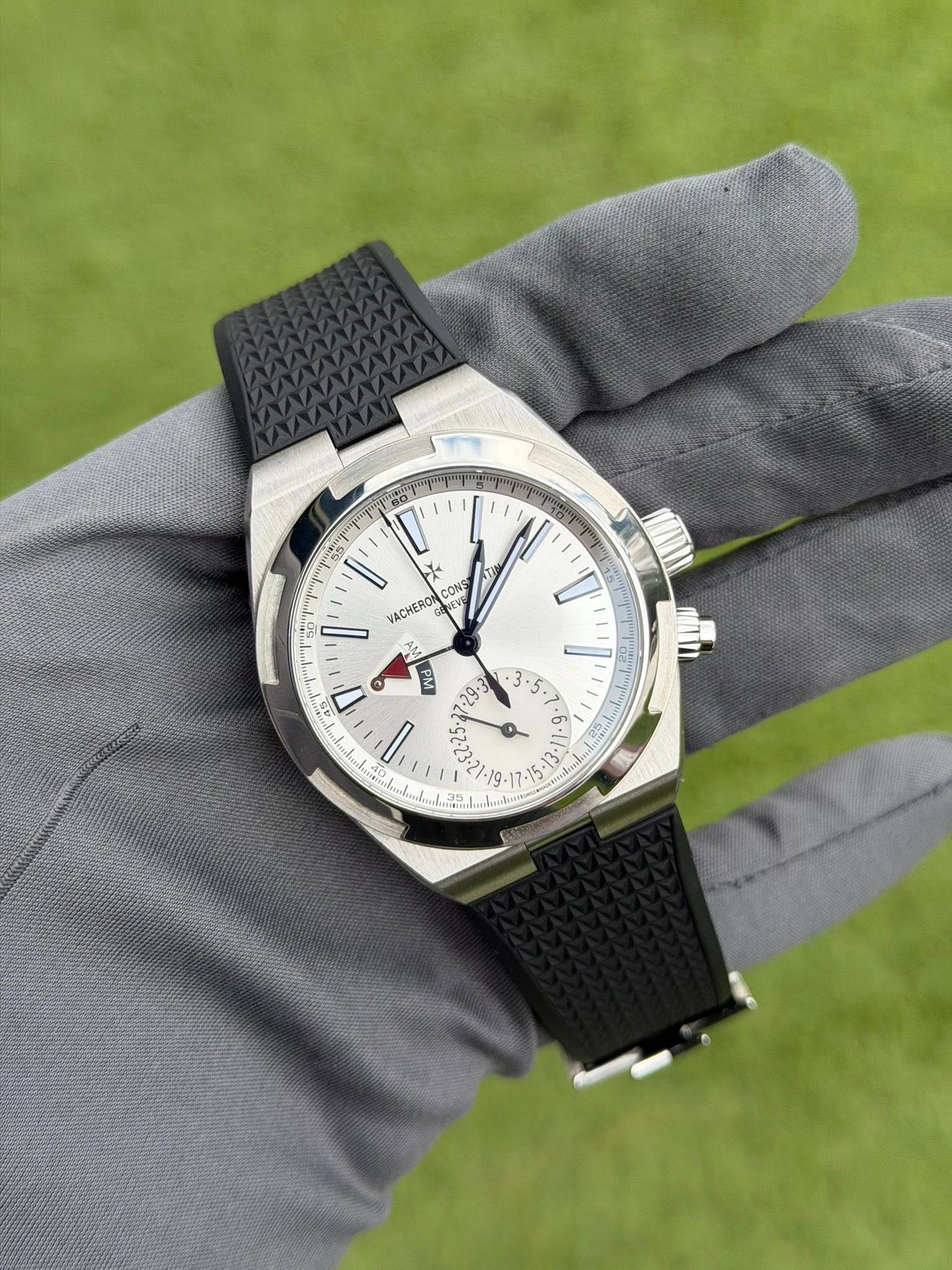 May be an image of wrist watch and text