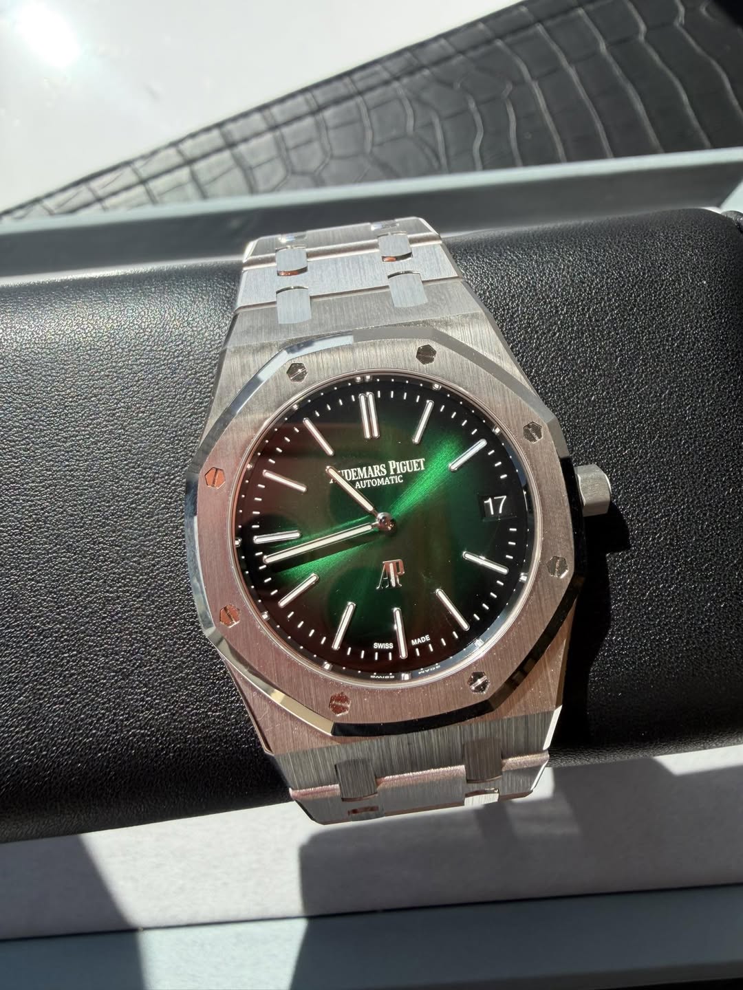 May be an image of wrist watch and text
