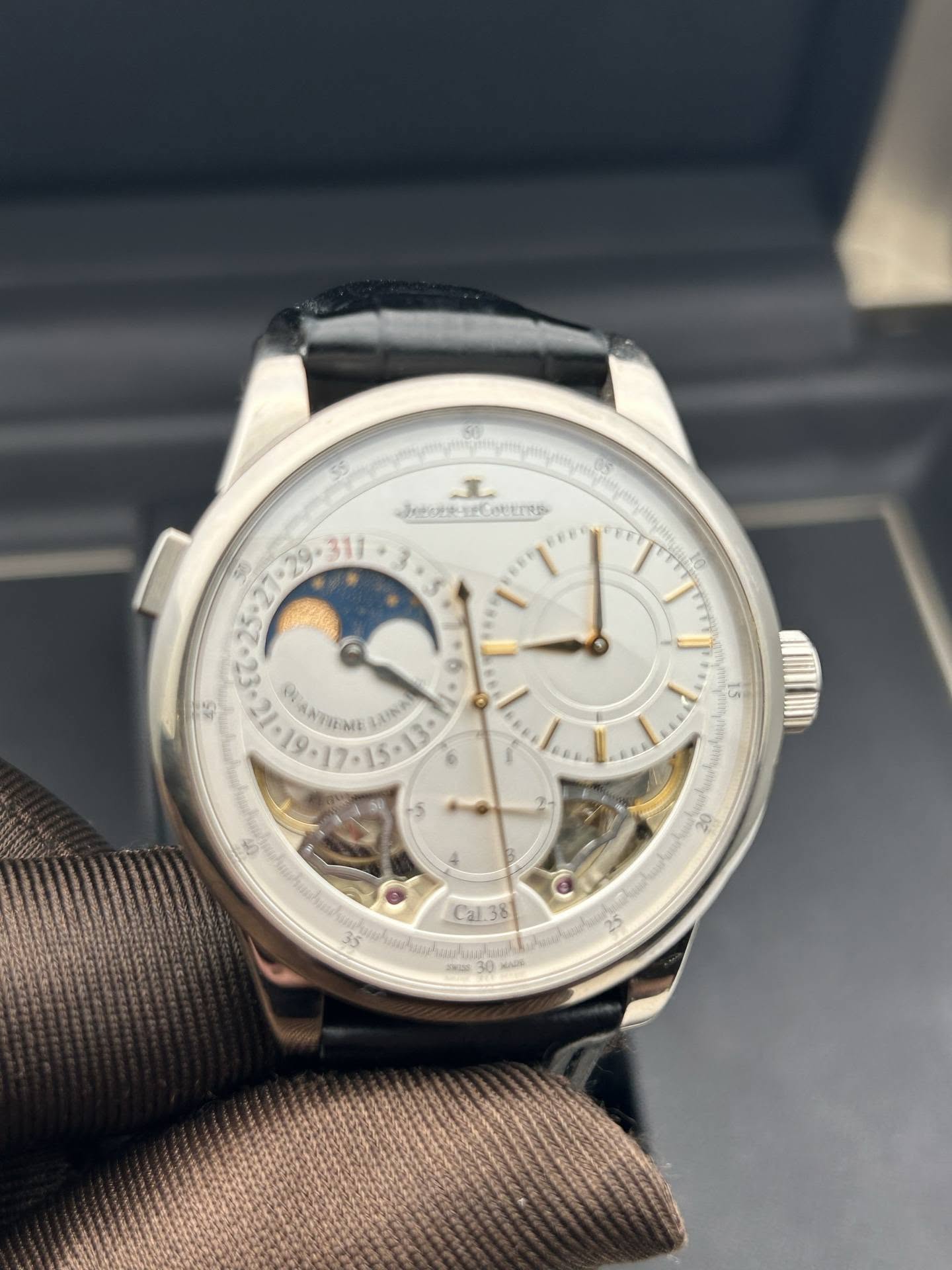 May be an image of wrist watch and text