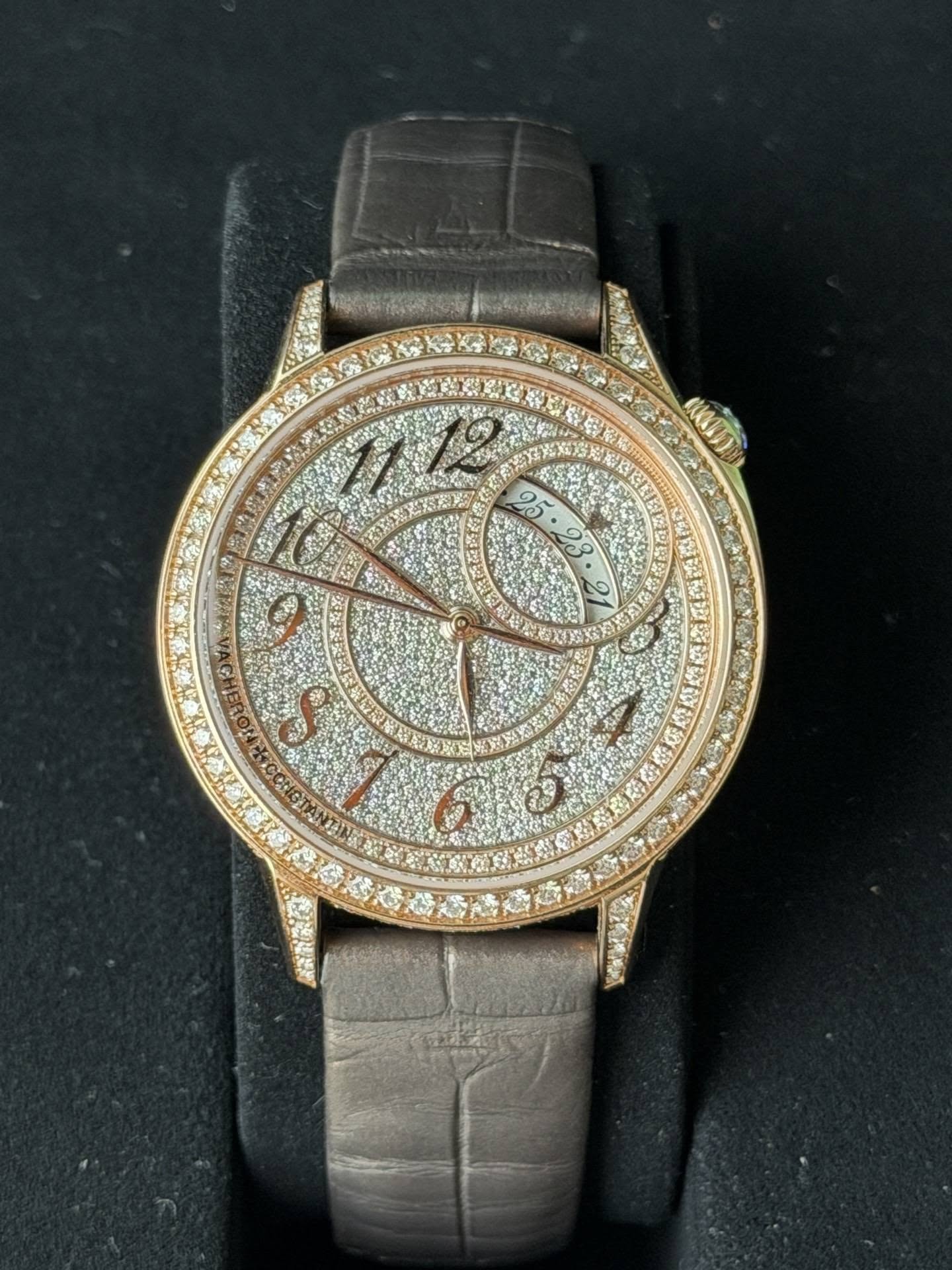 May be an image of wrist watch and text
