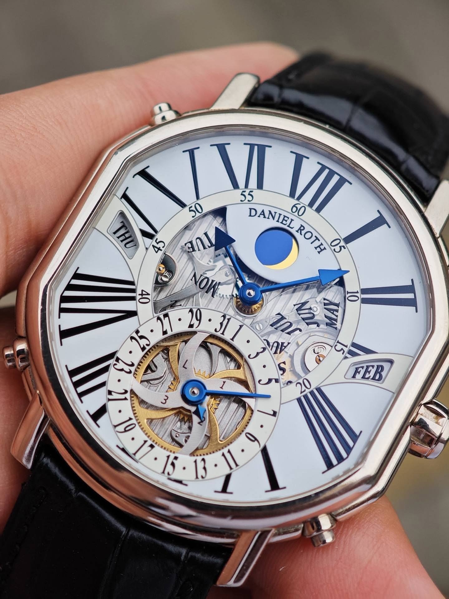May be an image of wrist watch and text that says 'IVI 50 55 DANIELROTH DANIEL VII 60 THU IVV 45 FUe ROTH 05 WI 04 าณ Nh 72 L1.61. LI 순 61. SI 13 10 20 FEB EB'