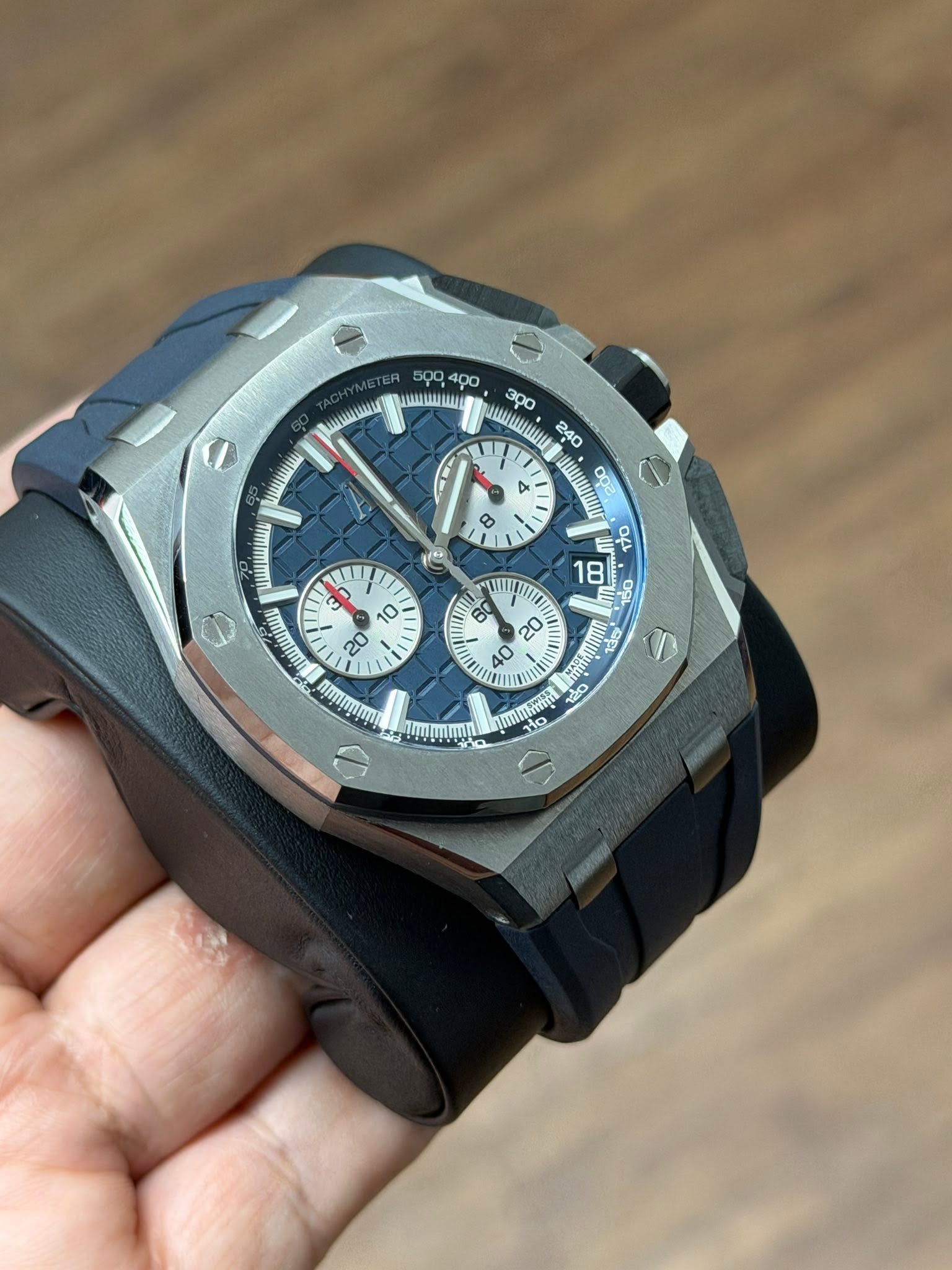 May be an image of wrist watch and text