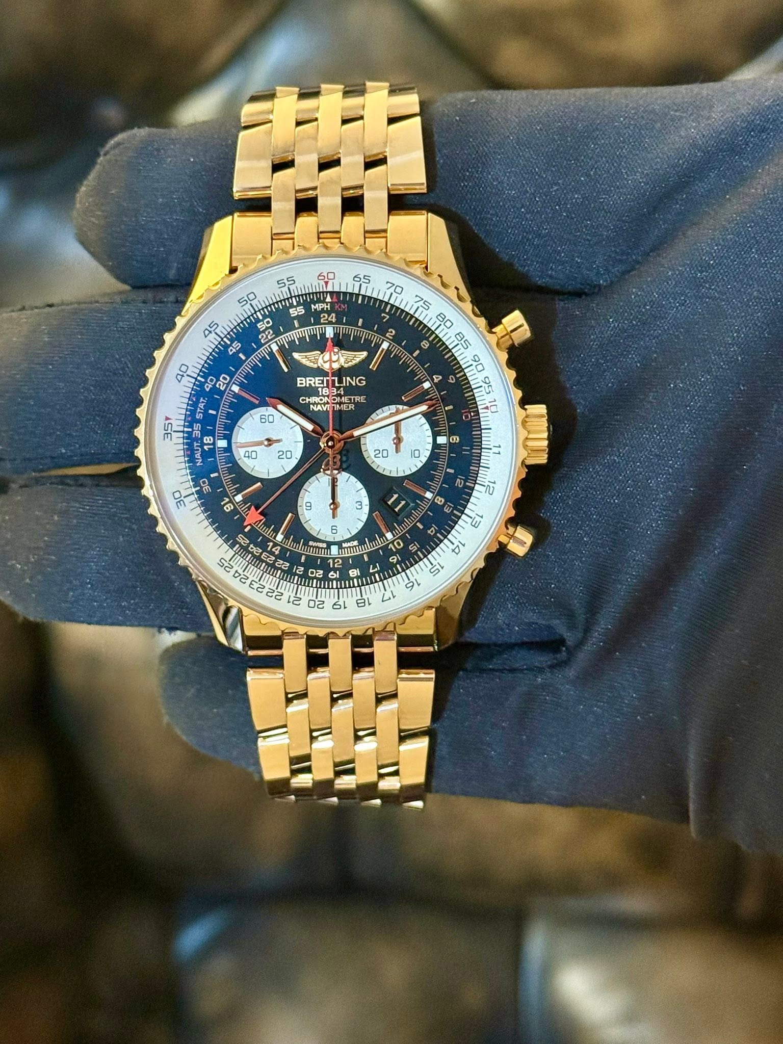 May be an image of wrist watch and text