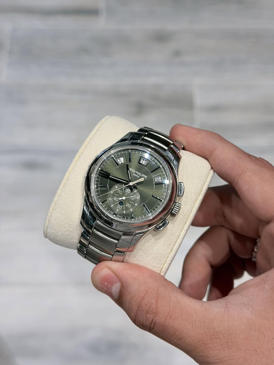 May be an image of wrist watch and text