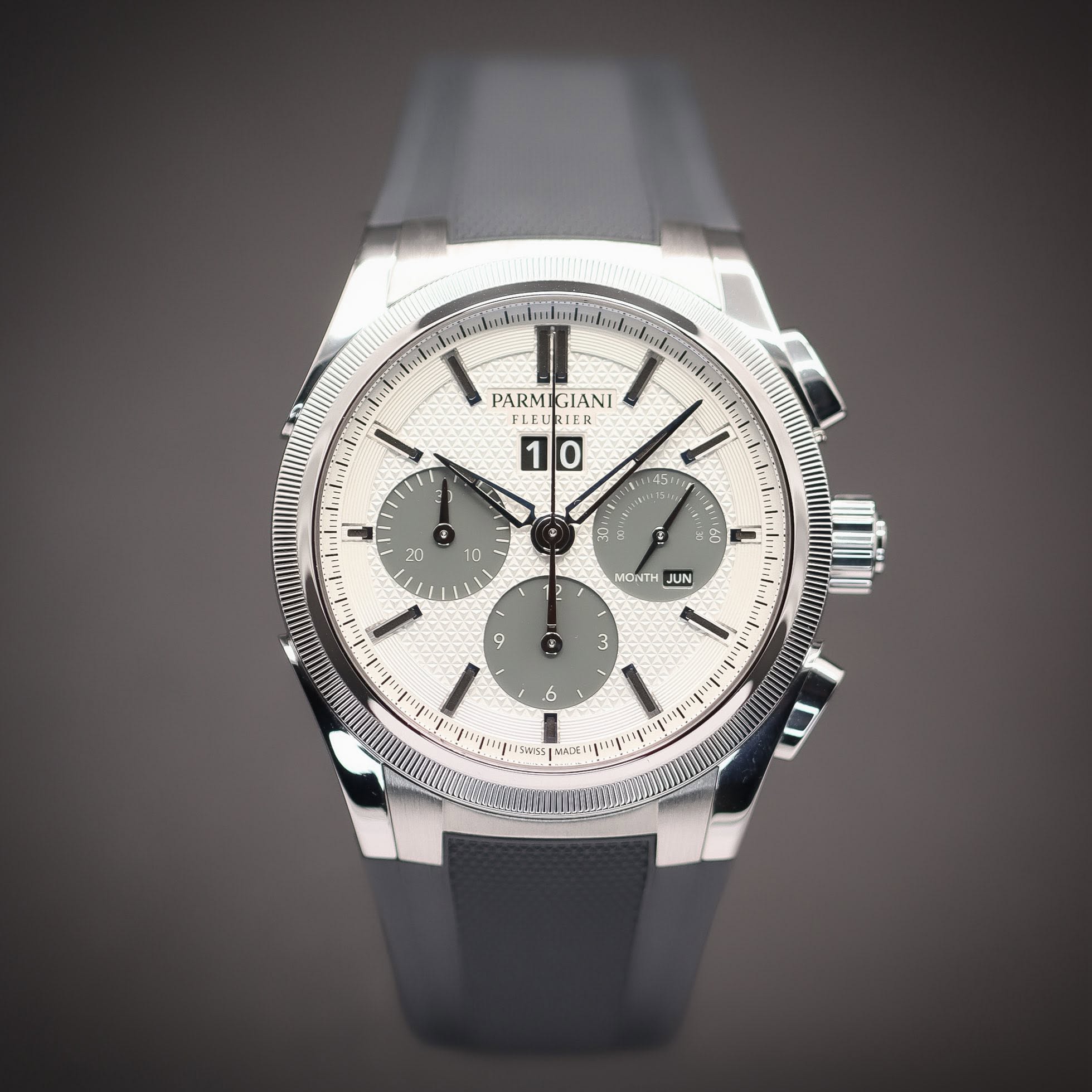 May be an image of wrist watch and text that says 'PARM GIANI LEURIER FLEMBIER RIER 10 45 45 TIM f # : 1 B S 1 1 MONTH JUN 9 3 6 6 SWTs MNDE'