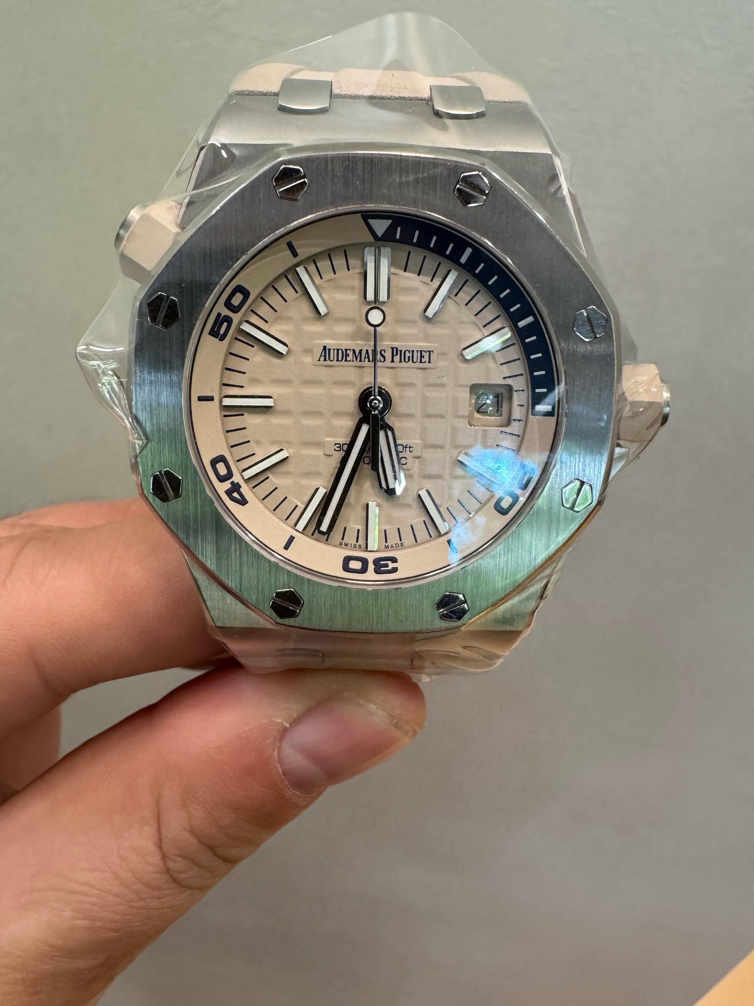 May be an image of wrist watch and text