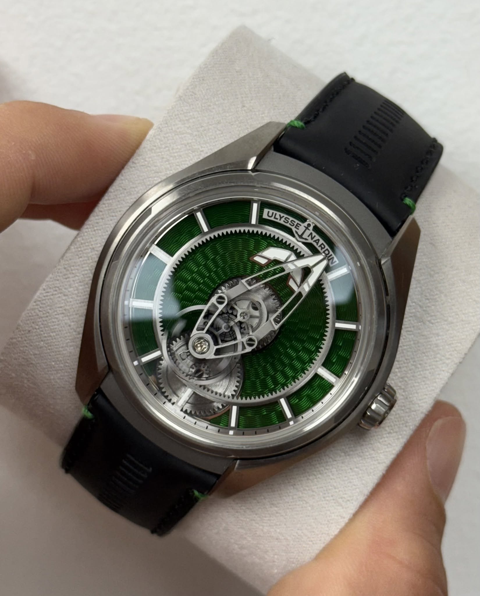 May be an image of wrist watch and text