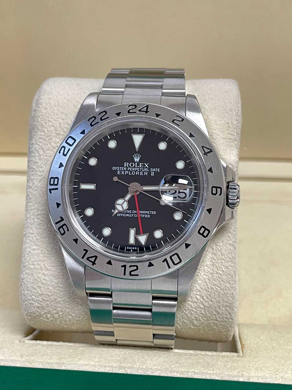 May be an image of wrist watch and text that says ' NIT OYSTERPERPETUK ROLEX EX OYSTER YSTERPERPETUAL STEOLEX OYSTERPERPETUALDA ETUAI DATE EXPLORER II 18 σι S TATIVEC OFFICIALLYC…