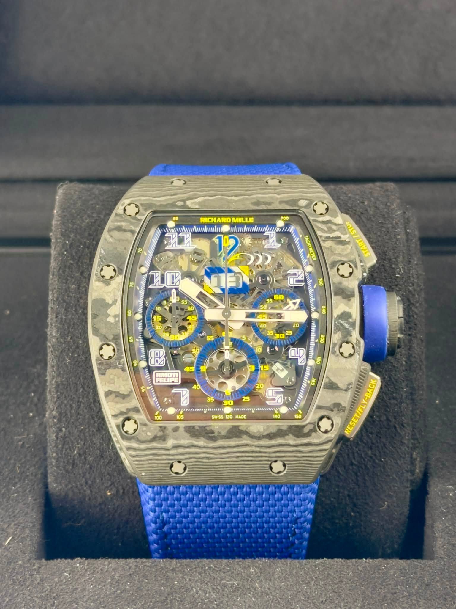 May be an image of wrist watch and text