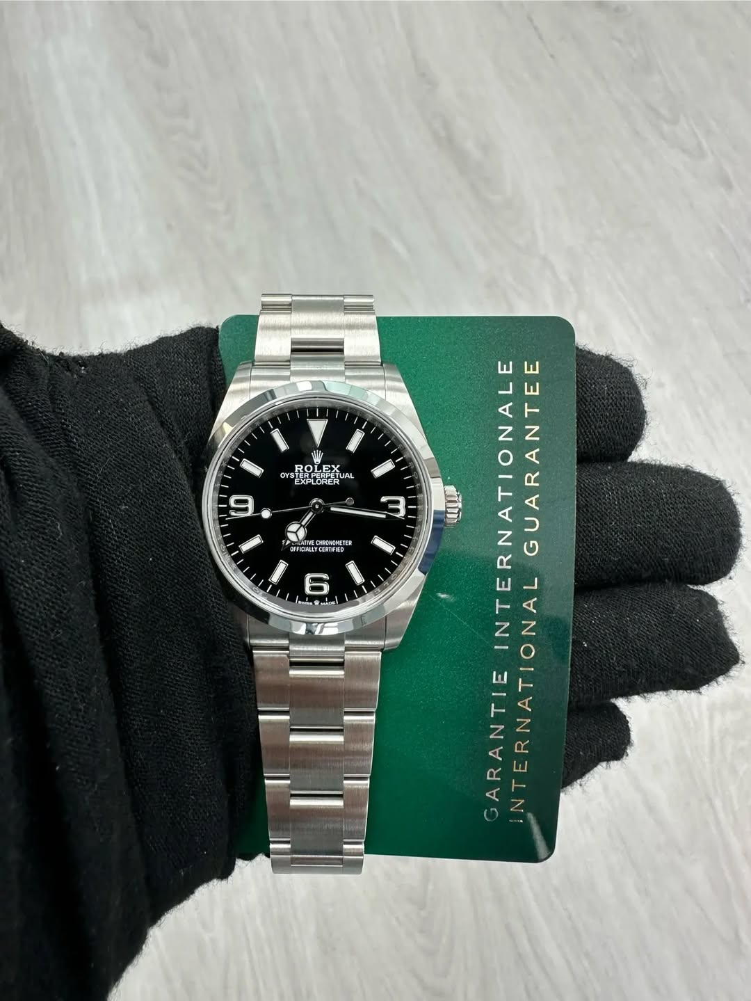 May be an image of wrist watch and text