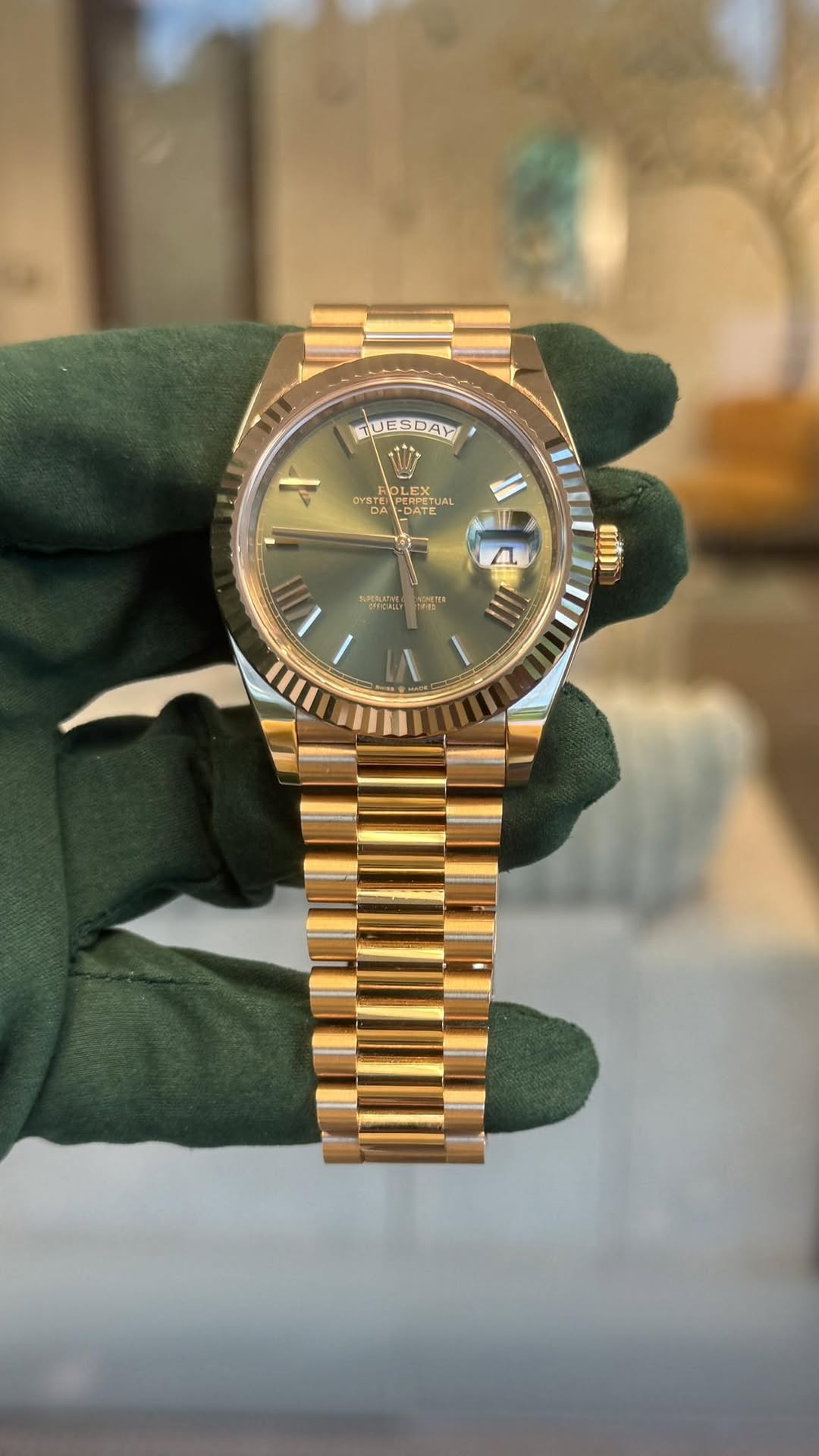 May be an image of wrist watch and text
