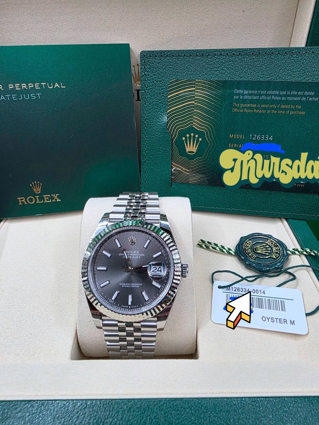 May be an image of wrist watch and text