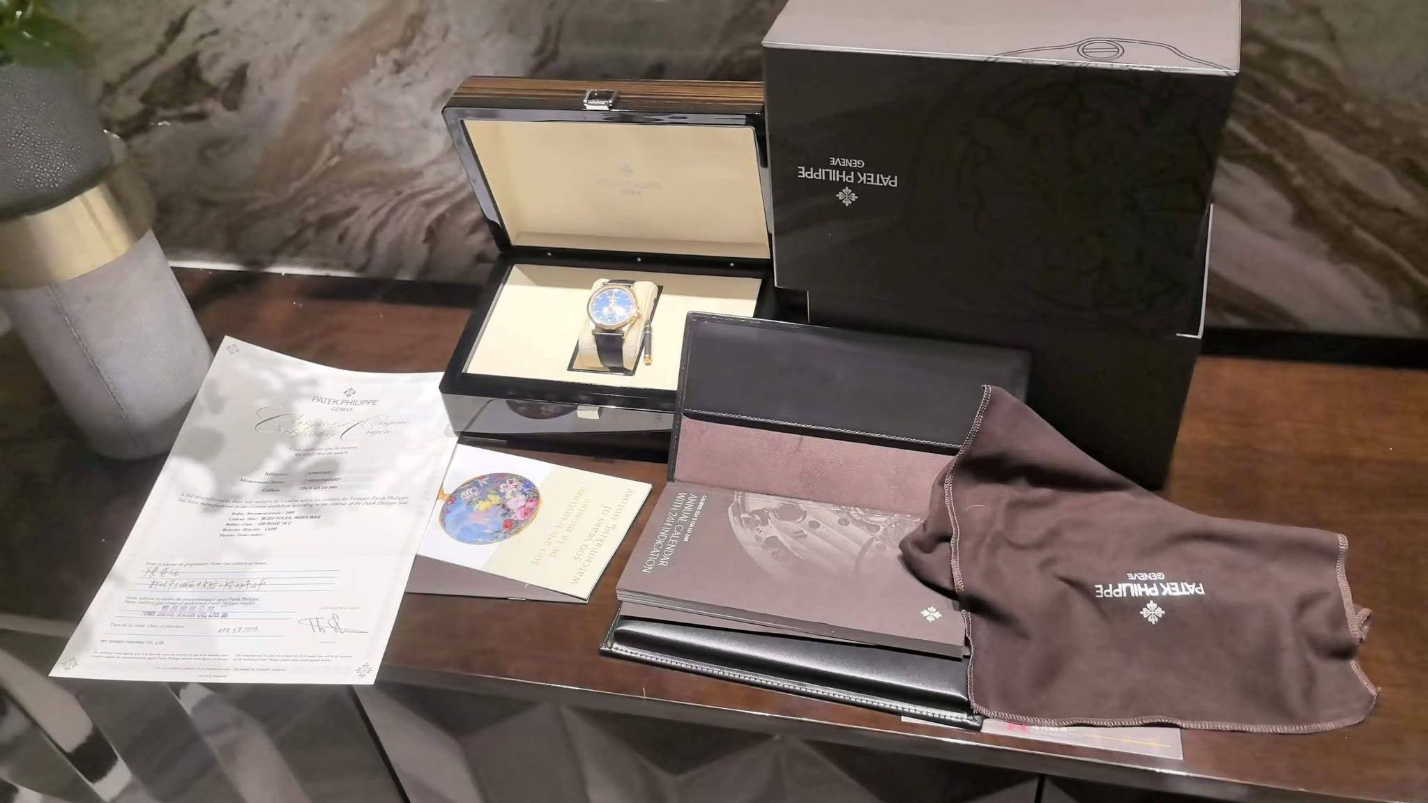 May be an image of cufflinks and text