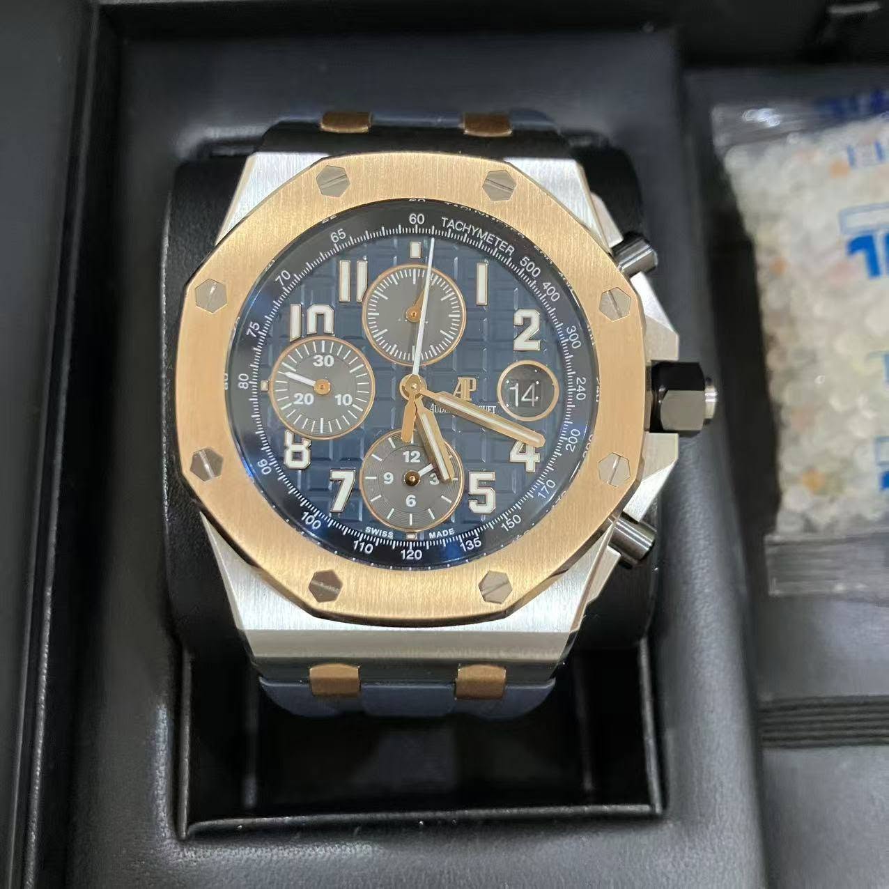 May be an image of wrist watch and text