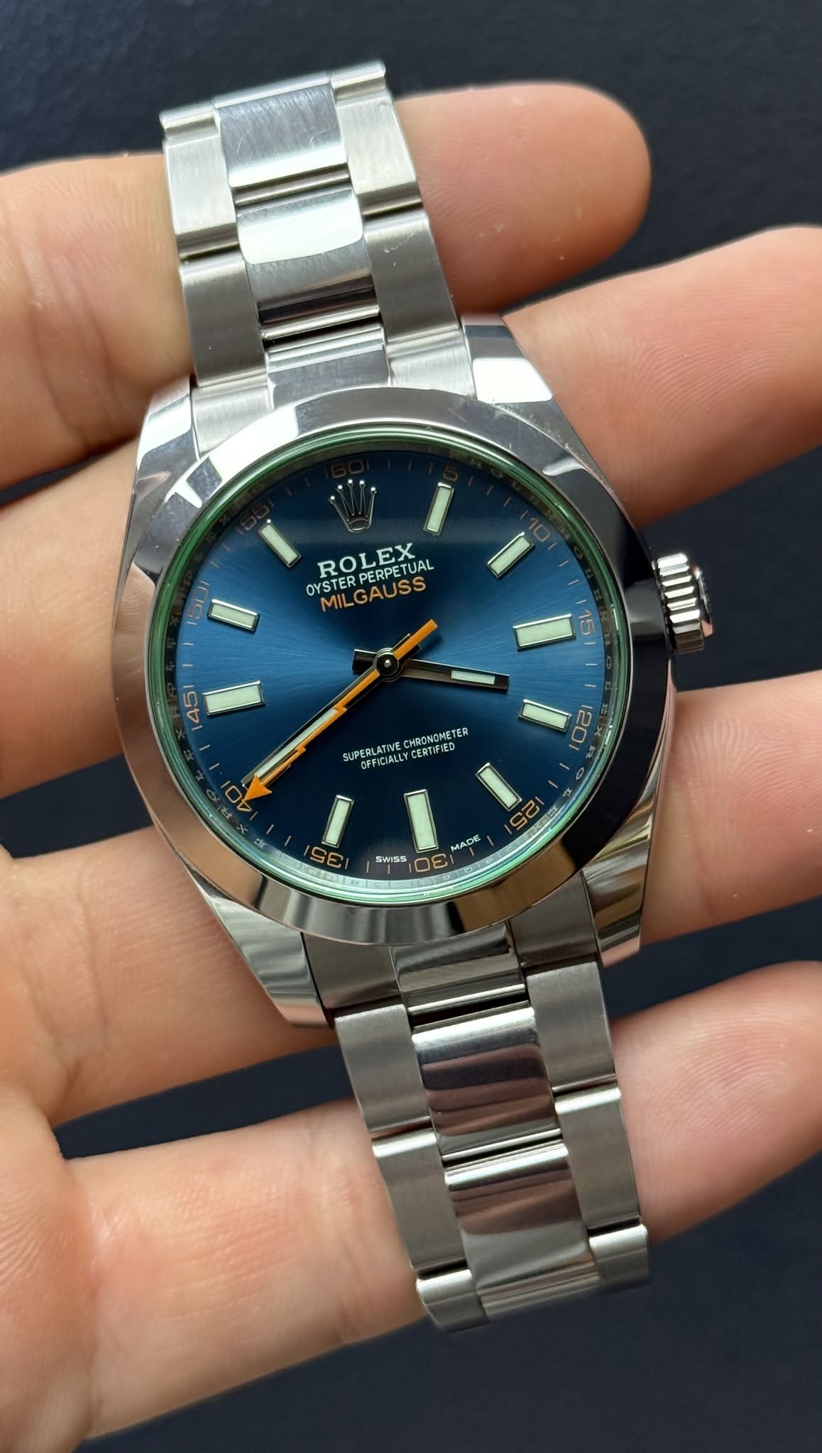 May be an image of wrist watch and text