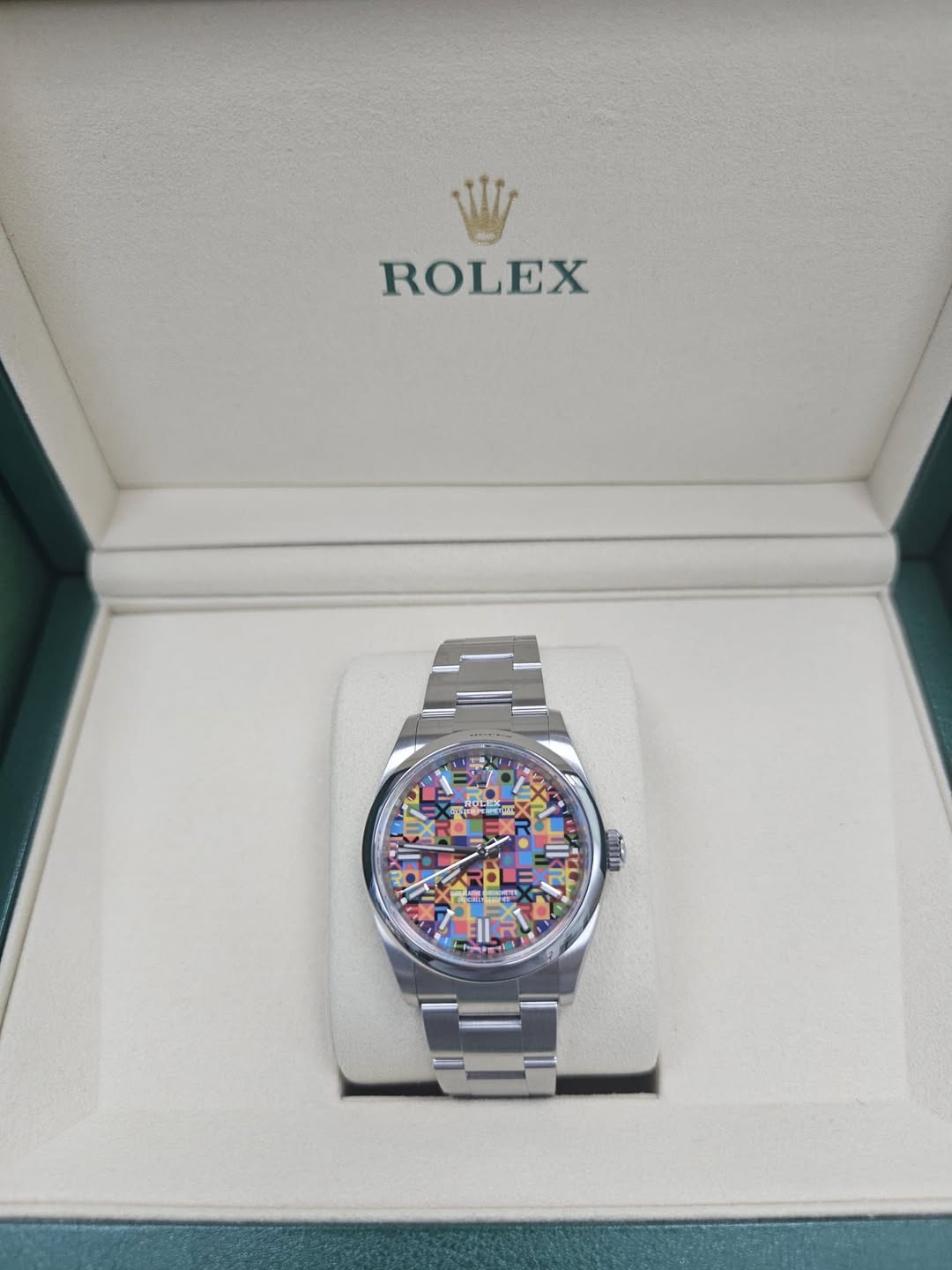 May be an image of wrist watch and text