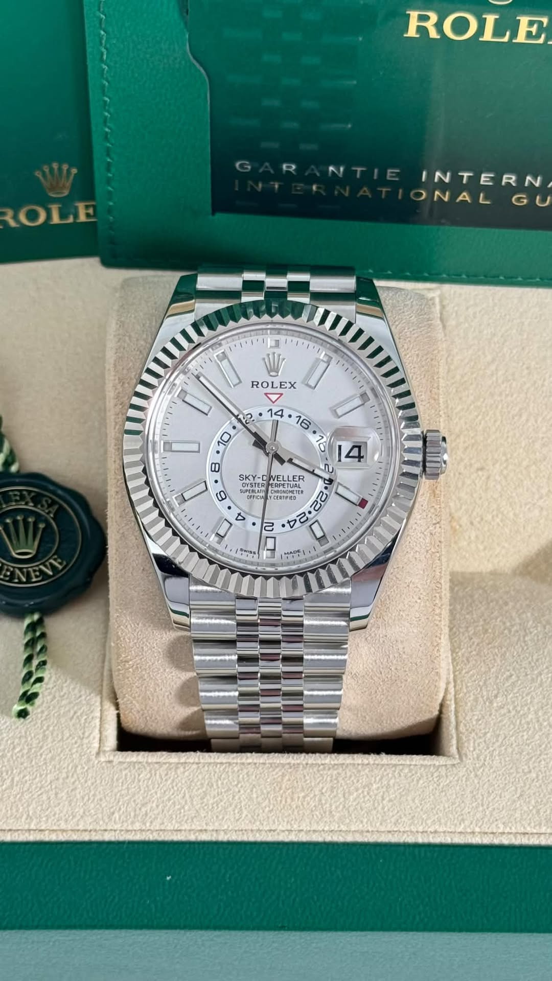 May be an image of wrist watch and text