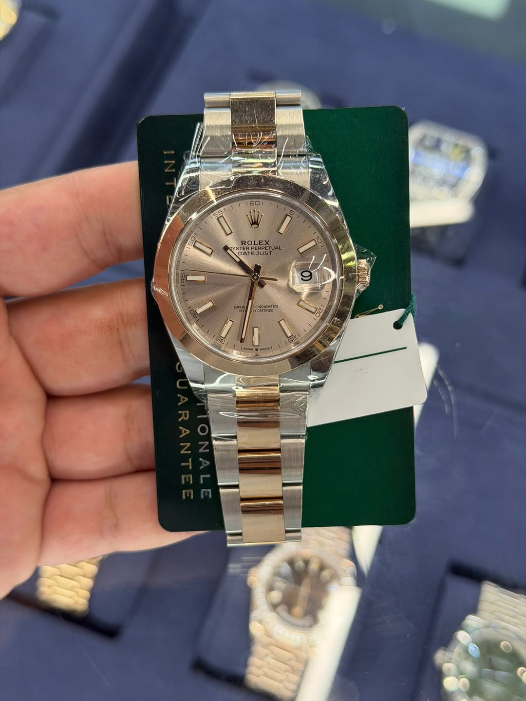 May be an image of wrist watch and text