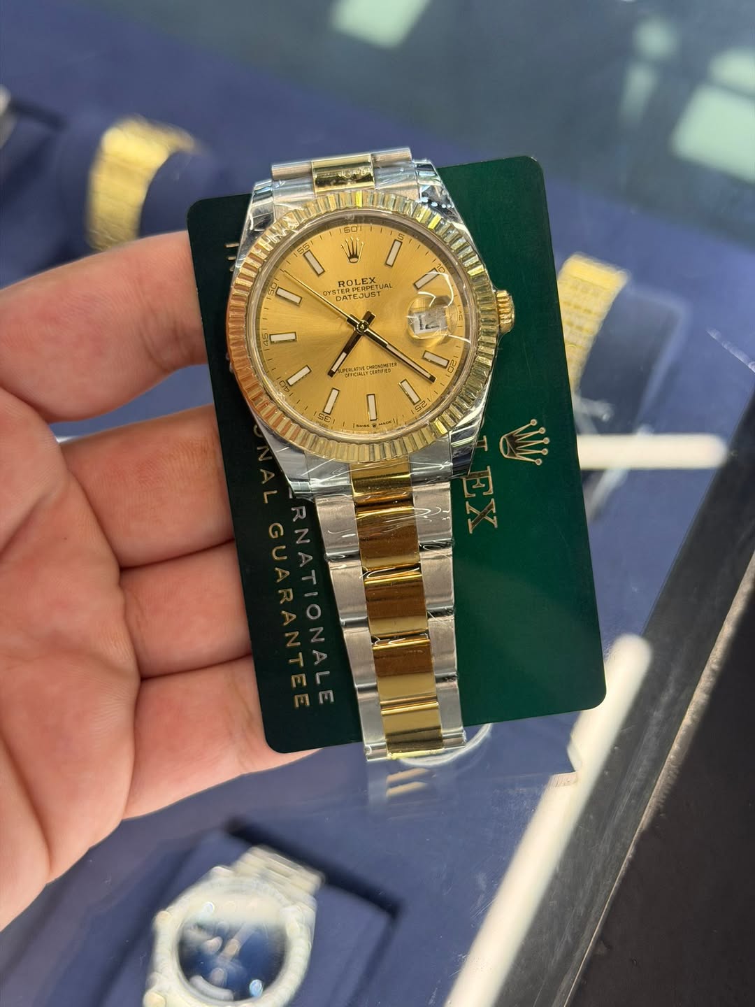 May be an image of wrist watch and text
