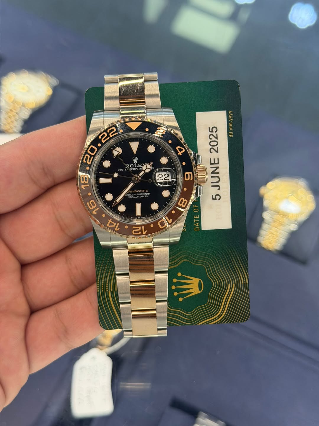 May be an image of wrist watch and text that says ' اد OL 18 22 yyyy 2025 dd.mm. JUNE 5 HO OF 10 AT DATE 12'