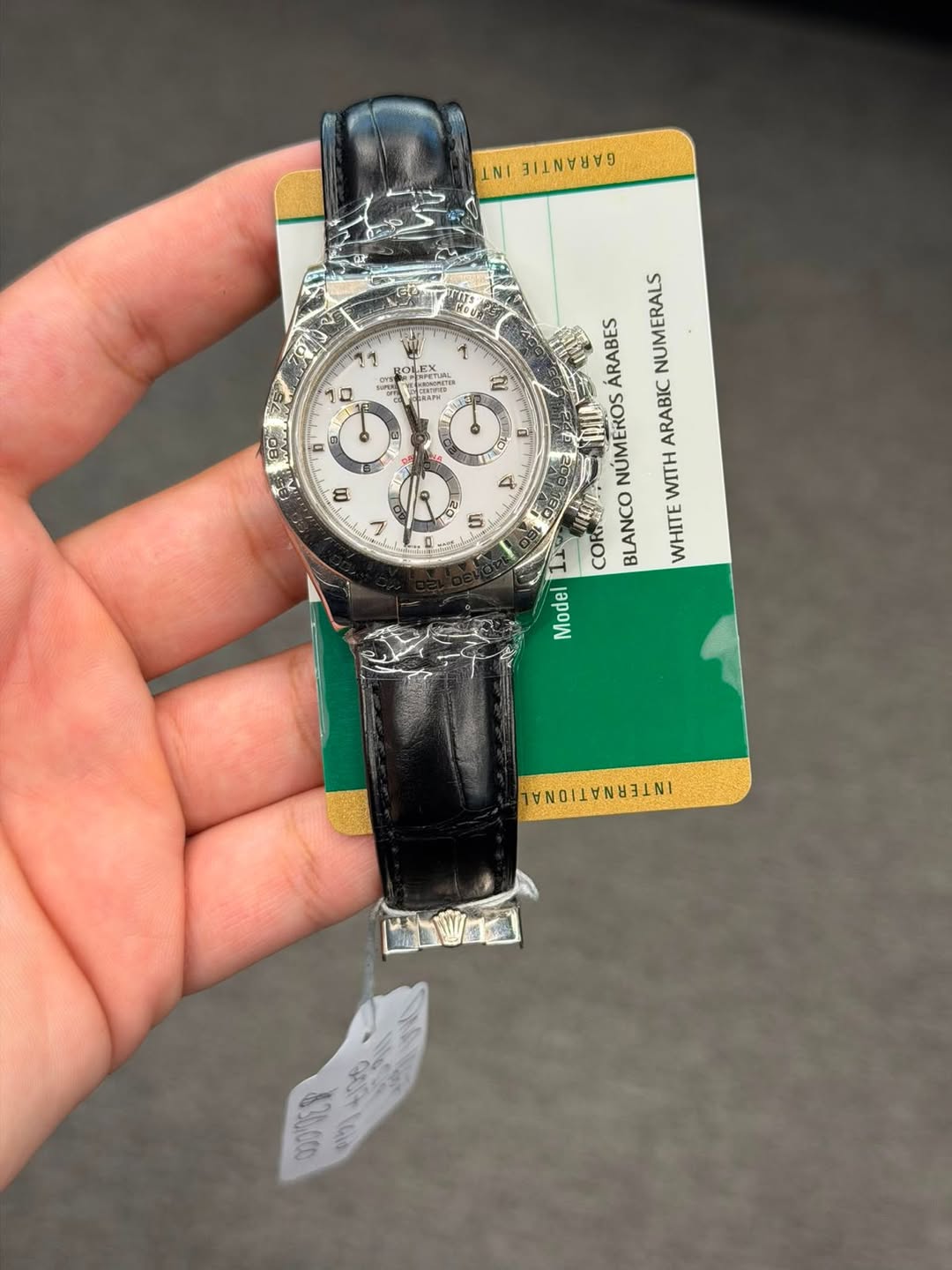 May be an image of wrist watch and text