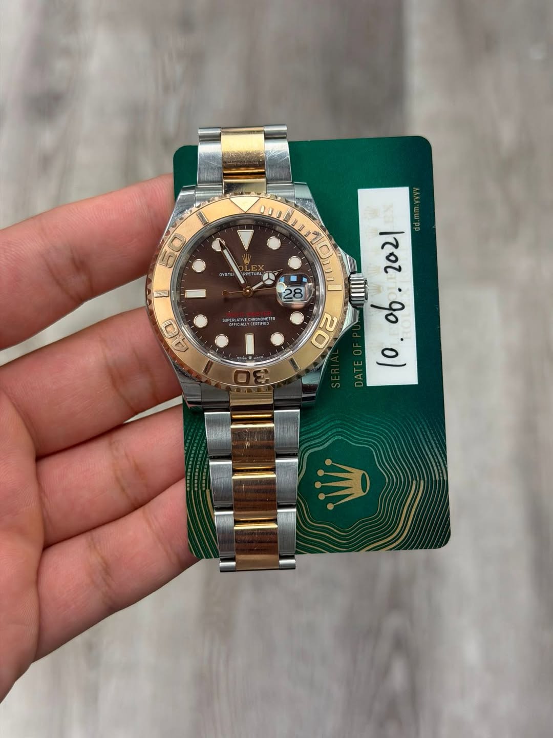 May be an image of wrist watch and text