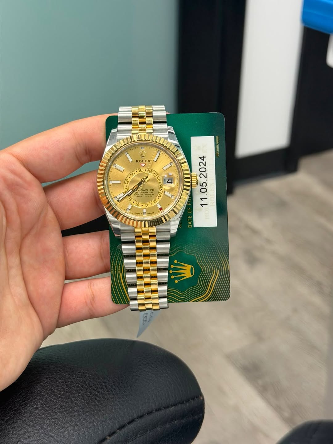 May be an image of wrist watch and text