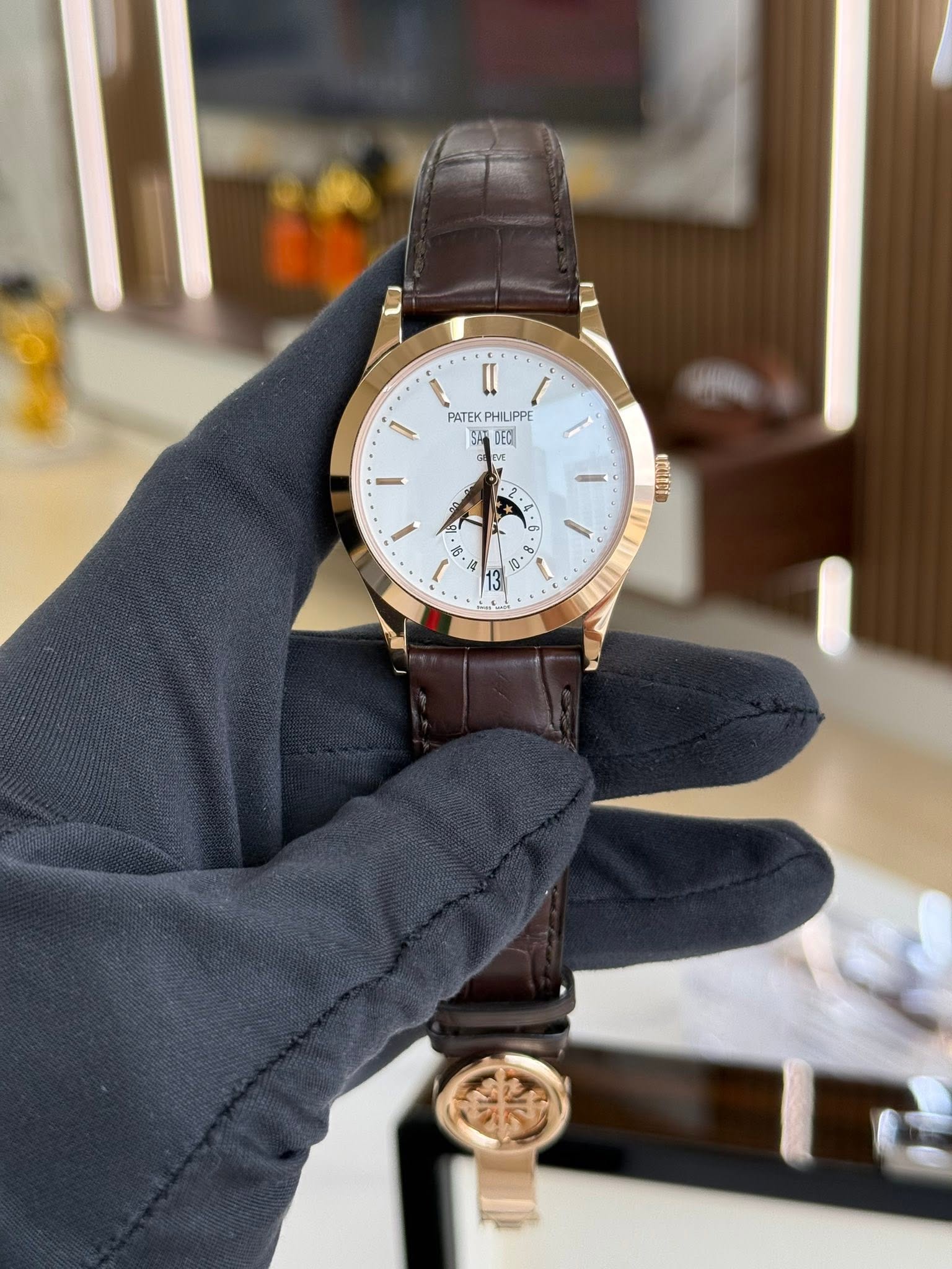 May be an image of wrist watch and text