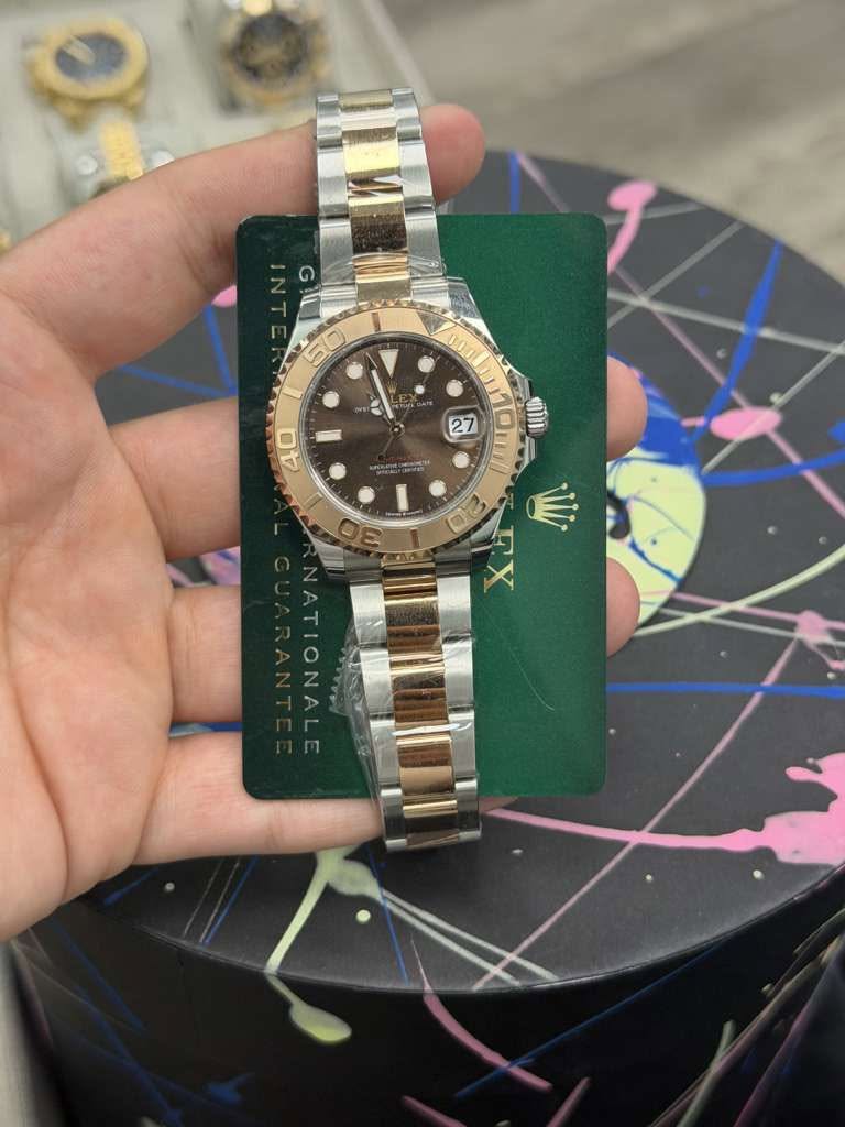 May be an image of wrist watch and text