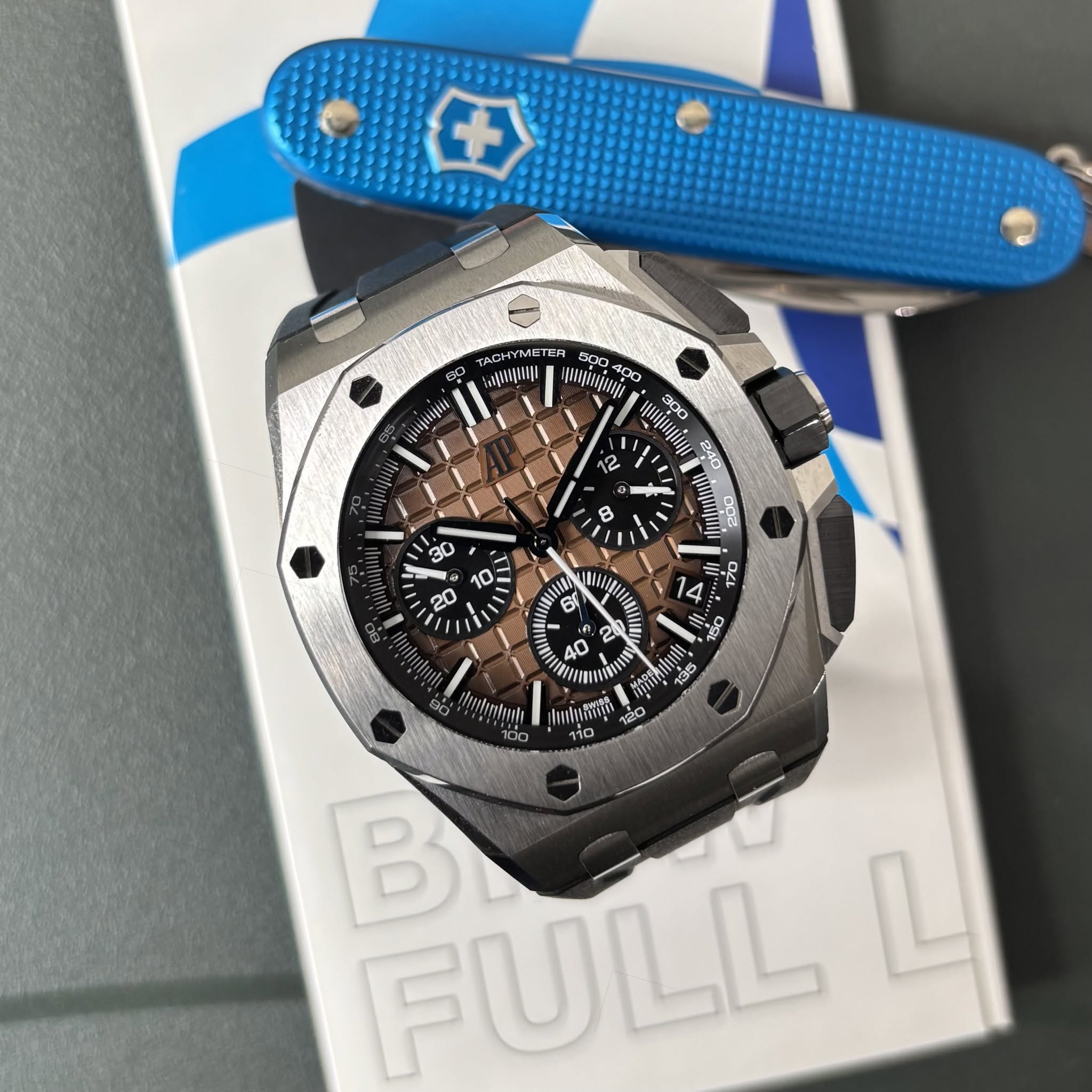 May be an image of knife, wrist watch and text