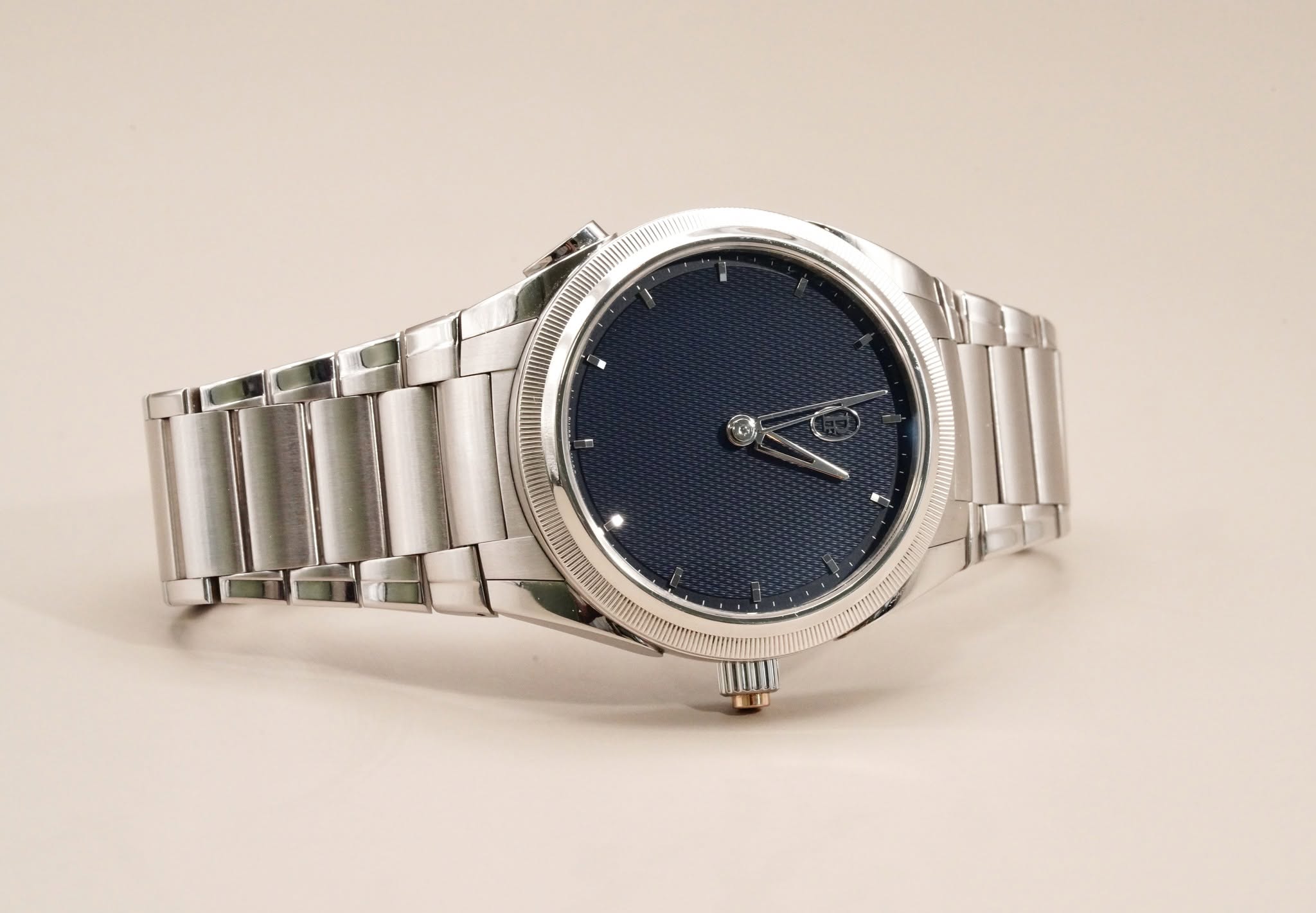 May be an image of wrist watch and text