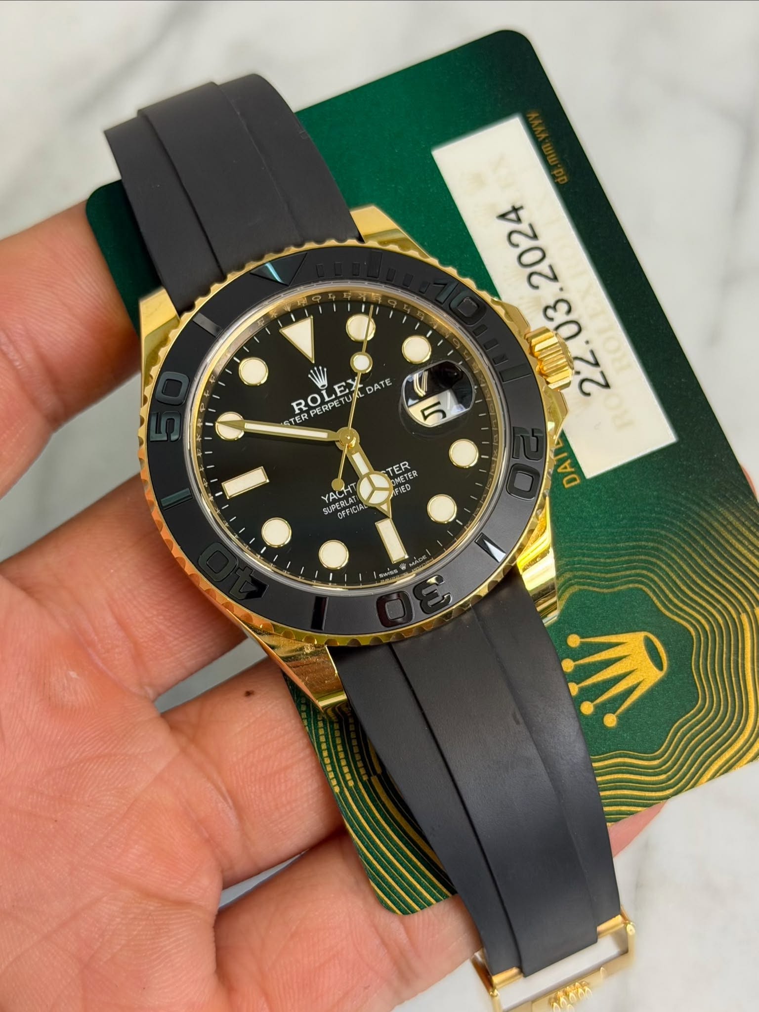 May be an image of wrist watch and text