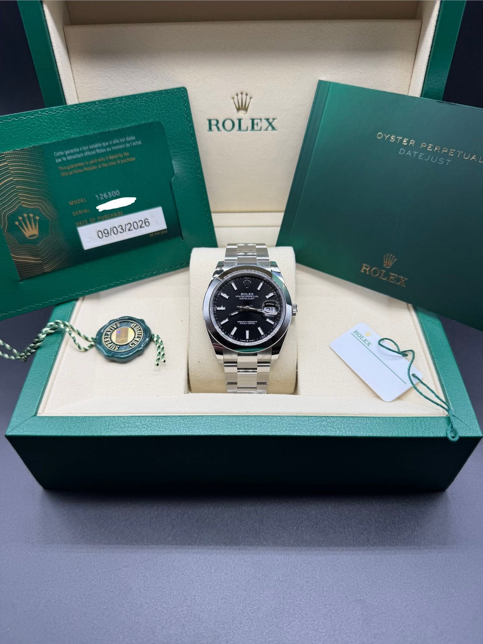 May be an image of wrist watch and text that says 'ROLEX 2630 OYSTERPERPETUA PERPETUA OYSTER DATEJUST 09/03/2026 X 대1 ROLEX e'