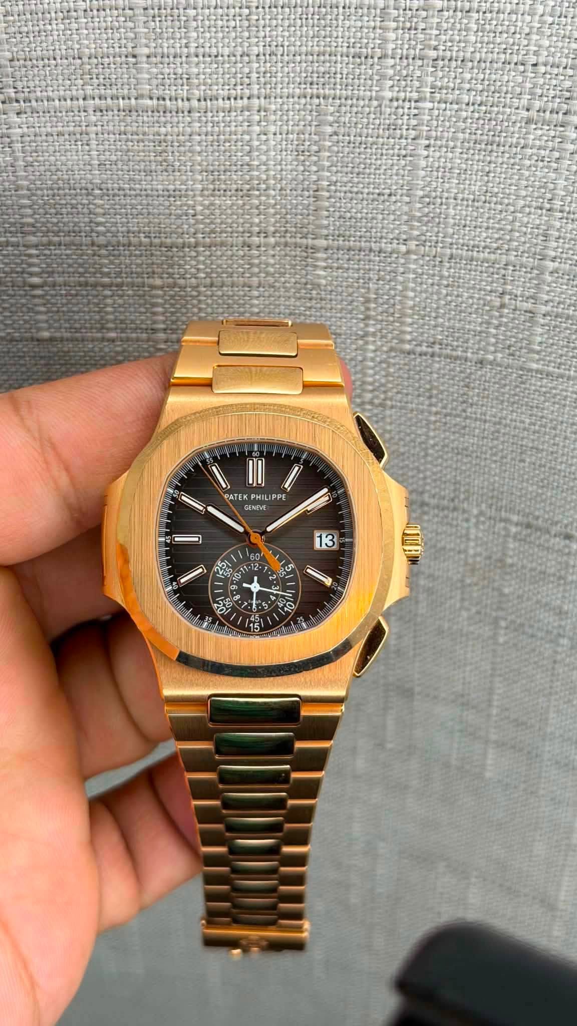 May be an image of wrist watch and text